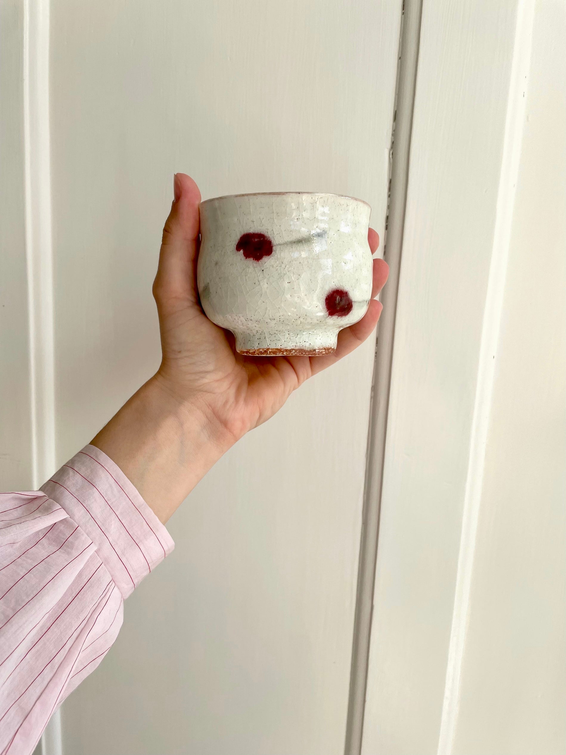 Japanese cup with cherry