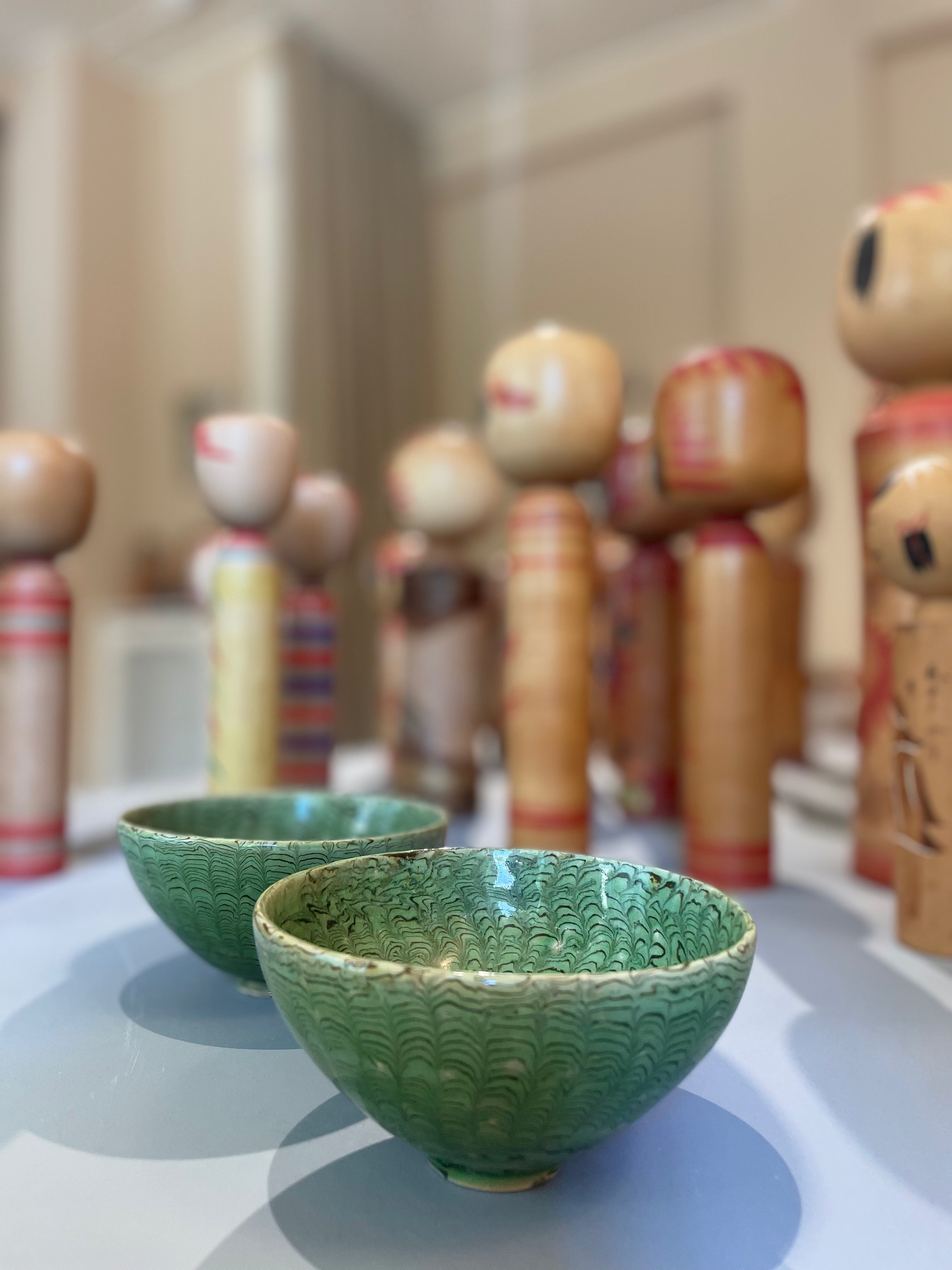 Handmade bowl in brown and green clay