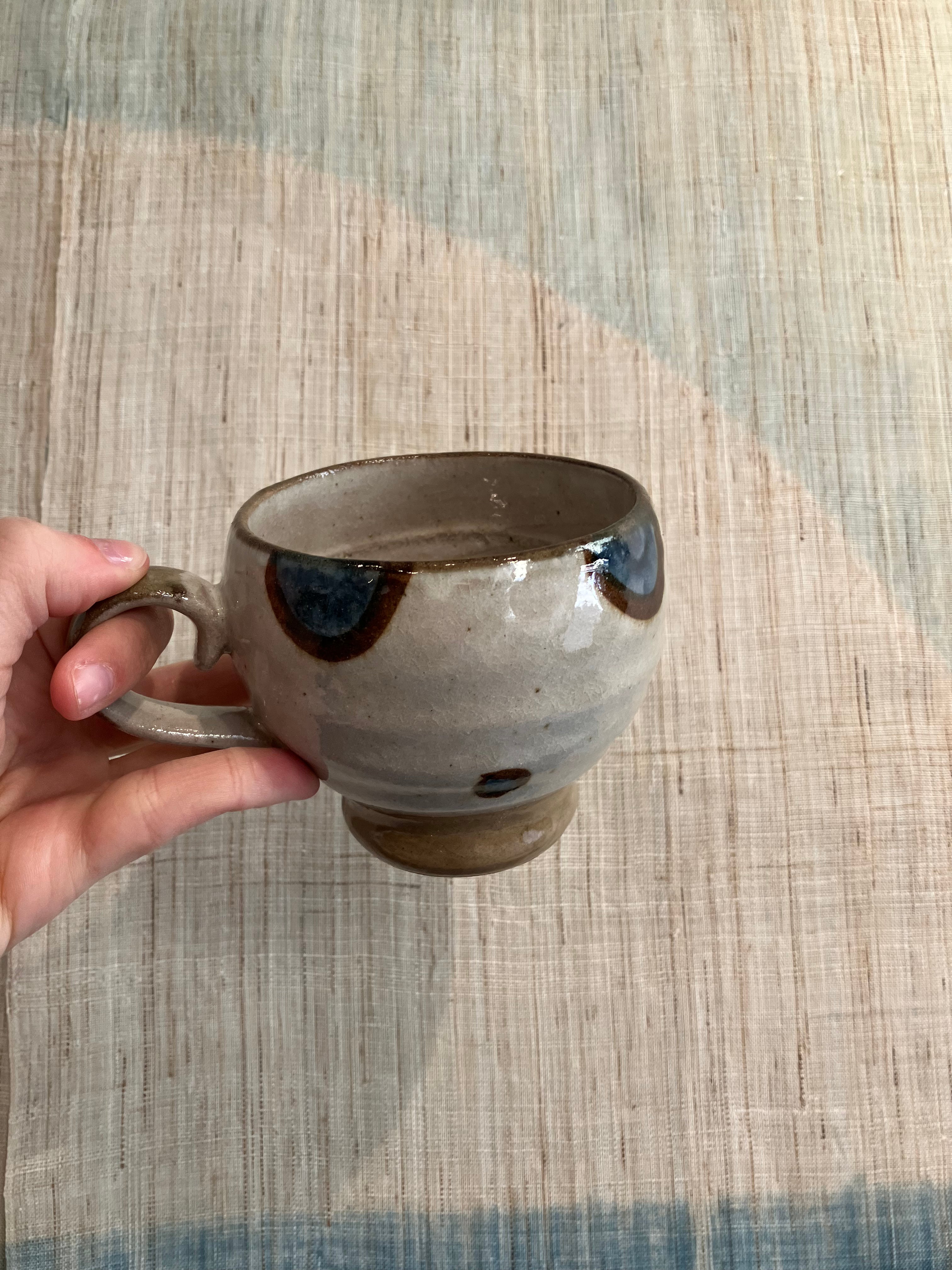 Japanese cup with blue/brown circles and dots
