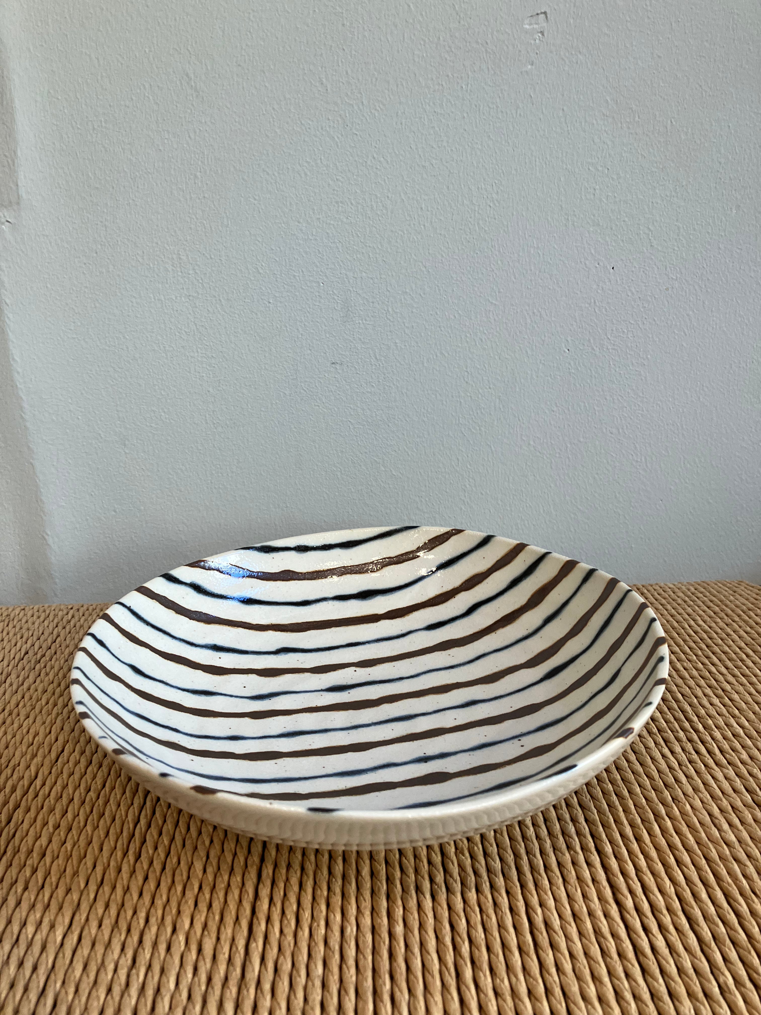Bowl with blue and brown stripes