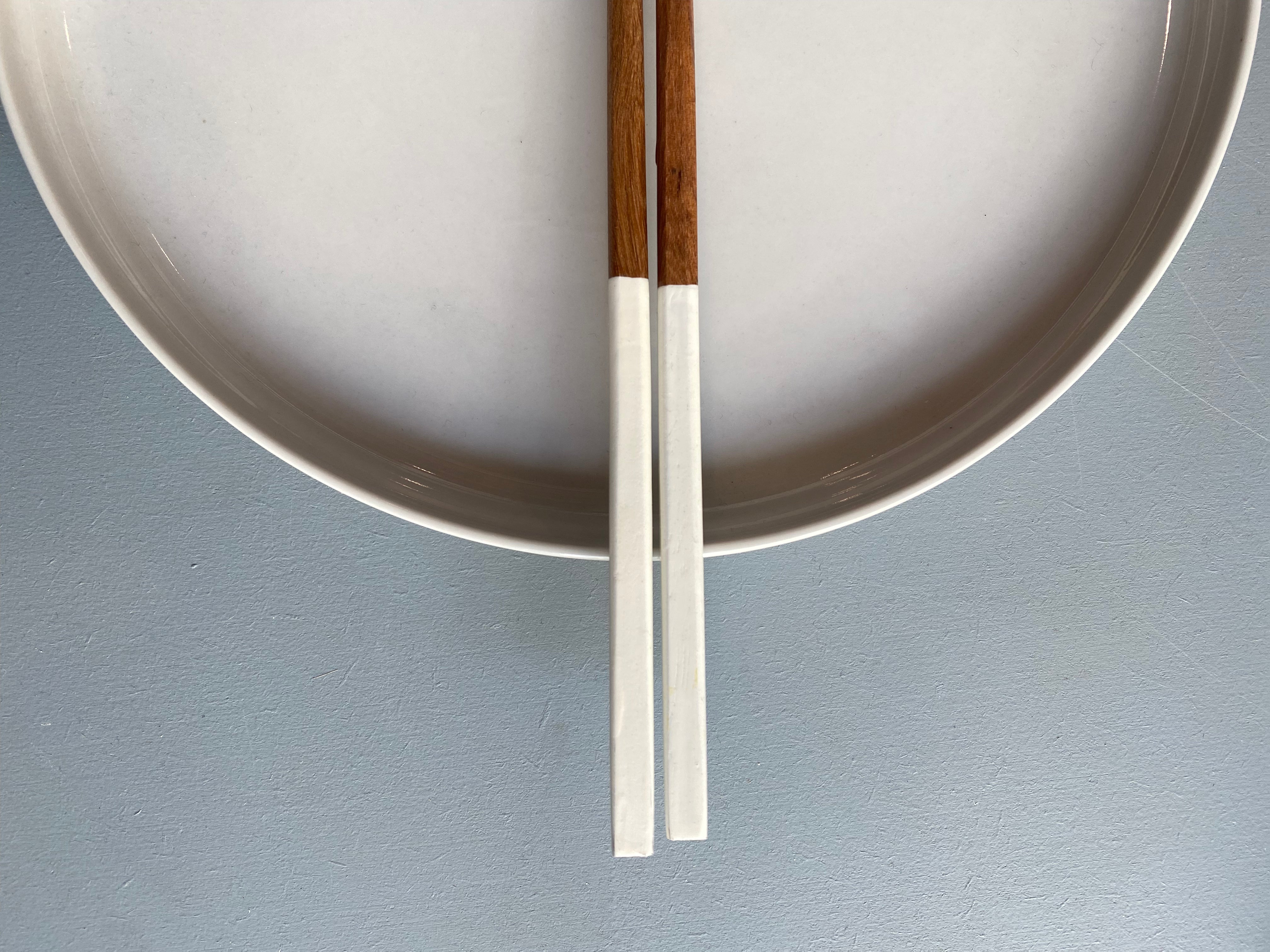 Chopsticks in dark wood