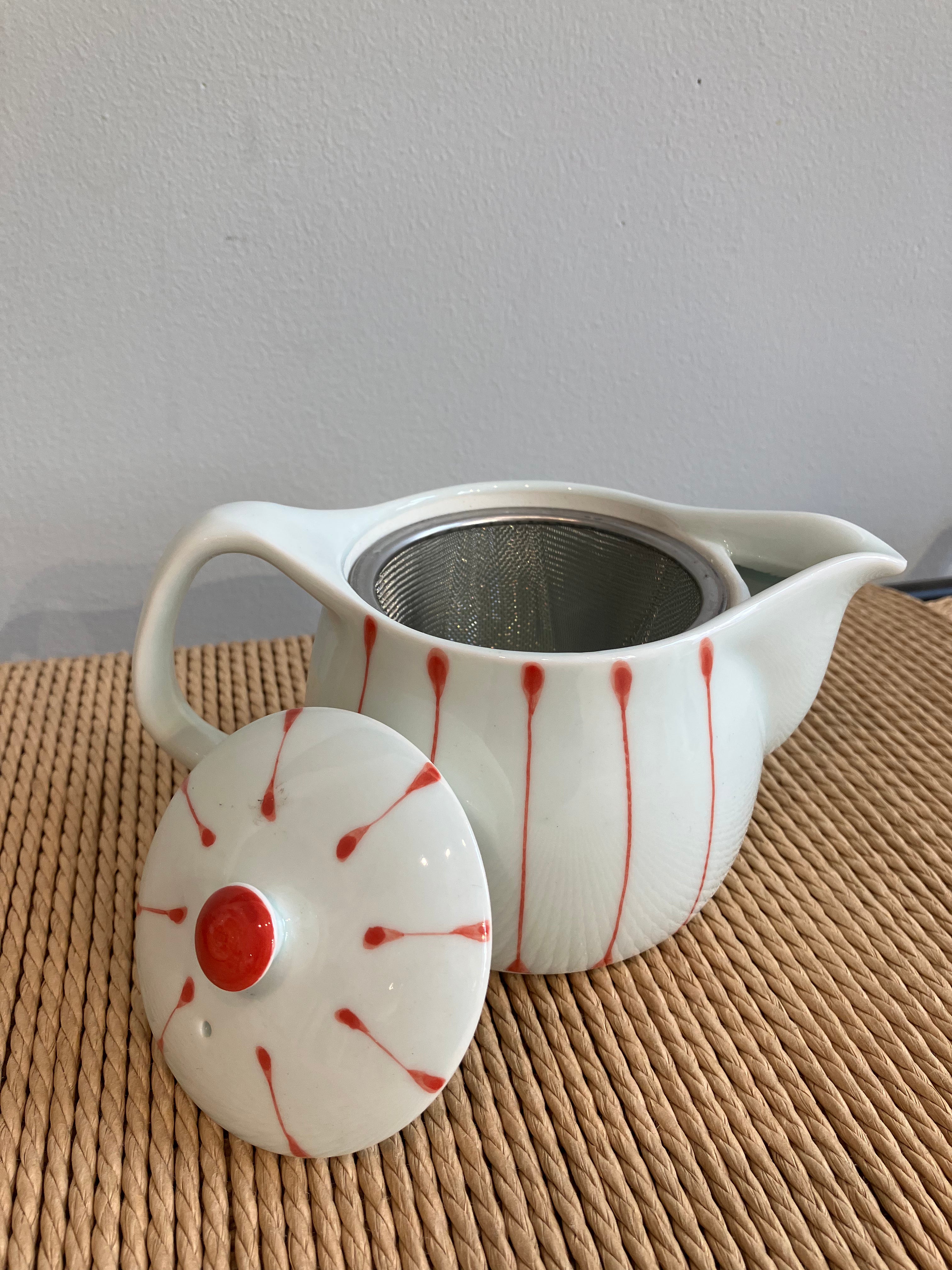Small teapot with white glaze and red stripes