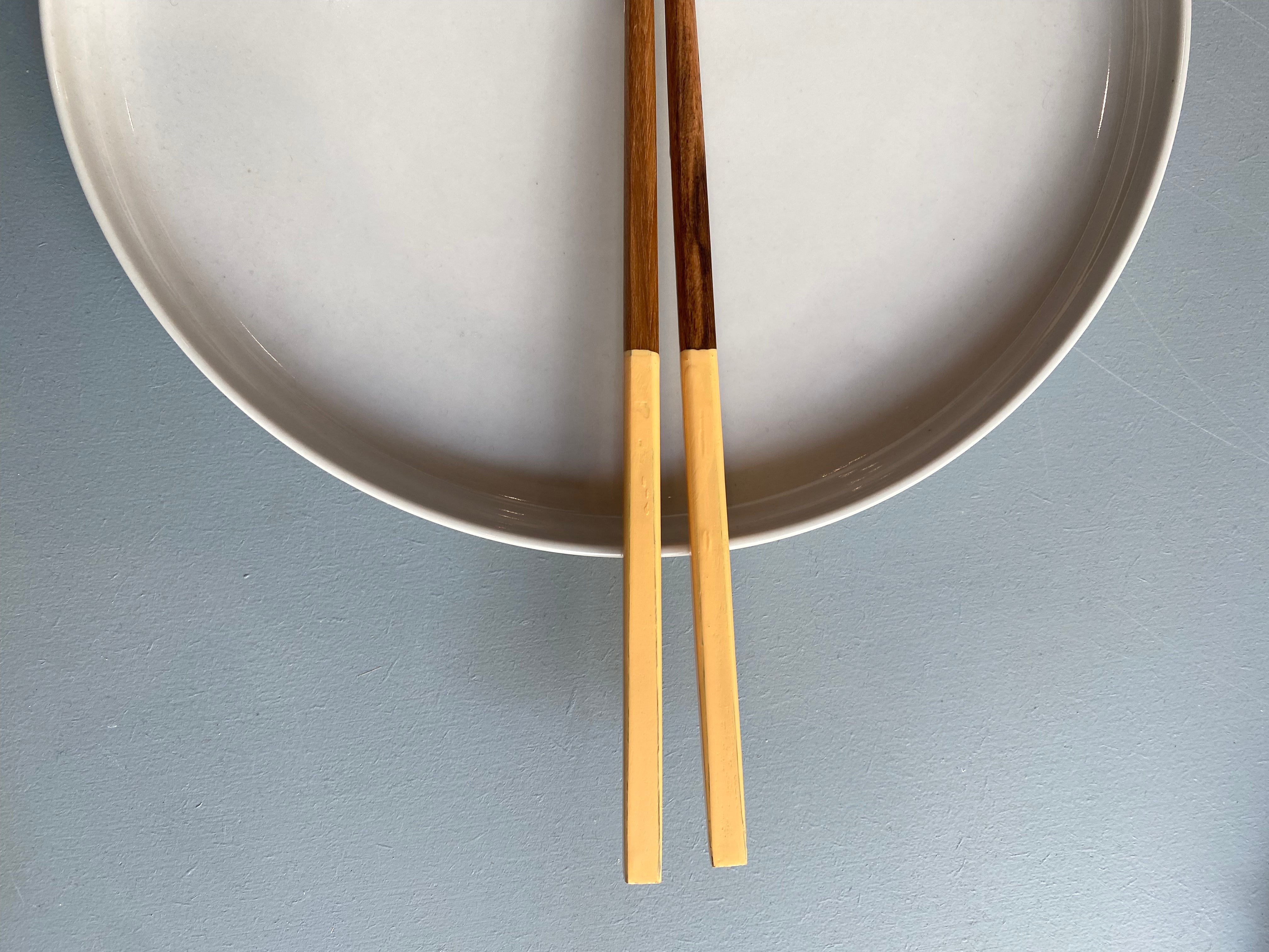 Chopsticks in dark wood