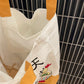 Tote bag med Shiba og skål med friturestegte rejer