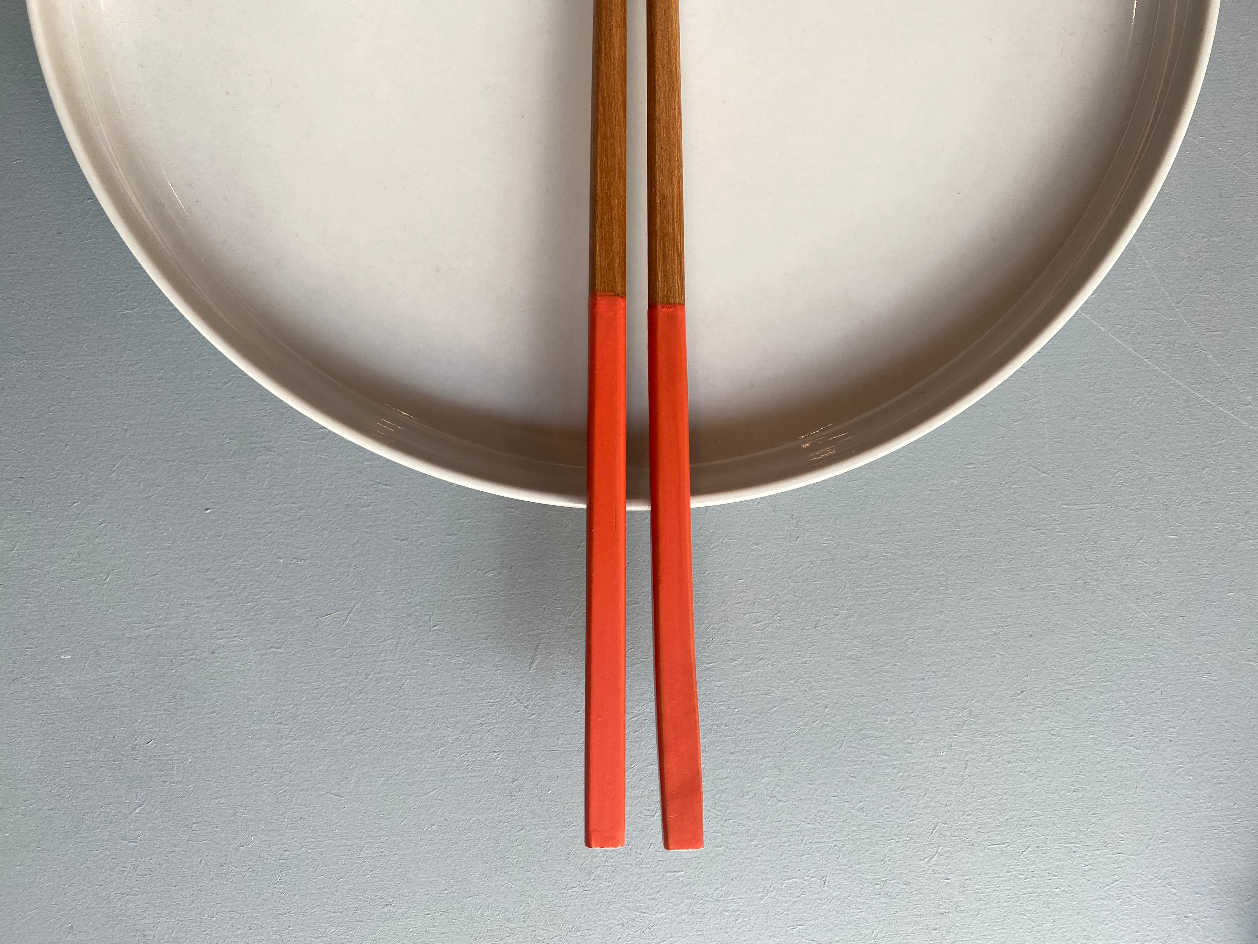 Chopsticks in dark wood