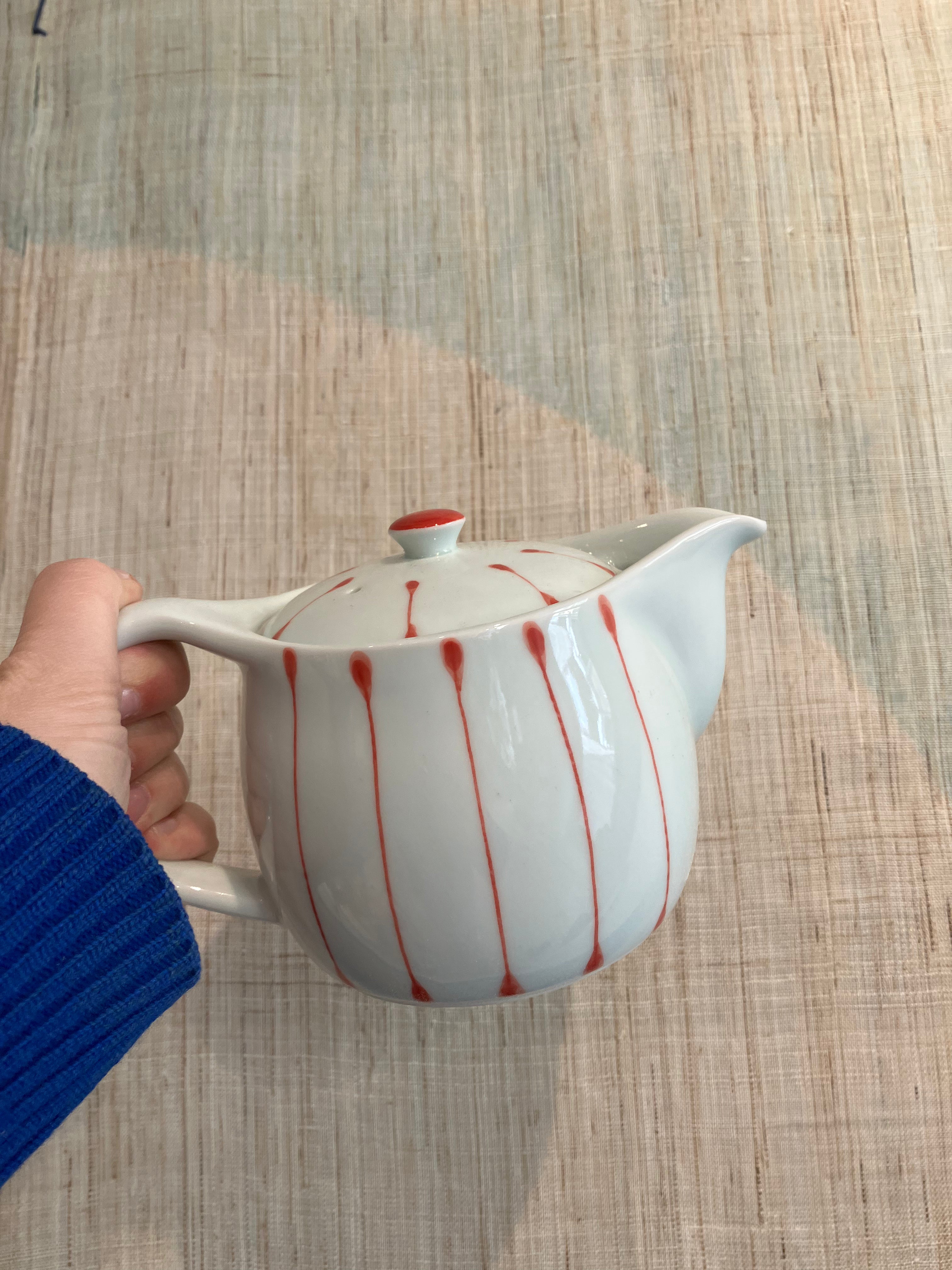 Small teapot with white glaze and red stripes