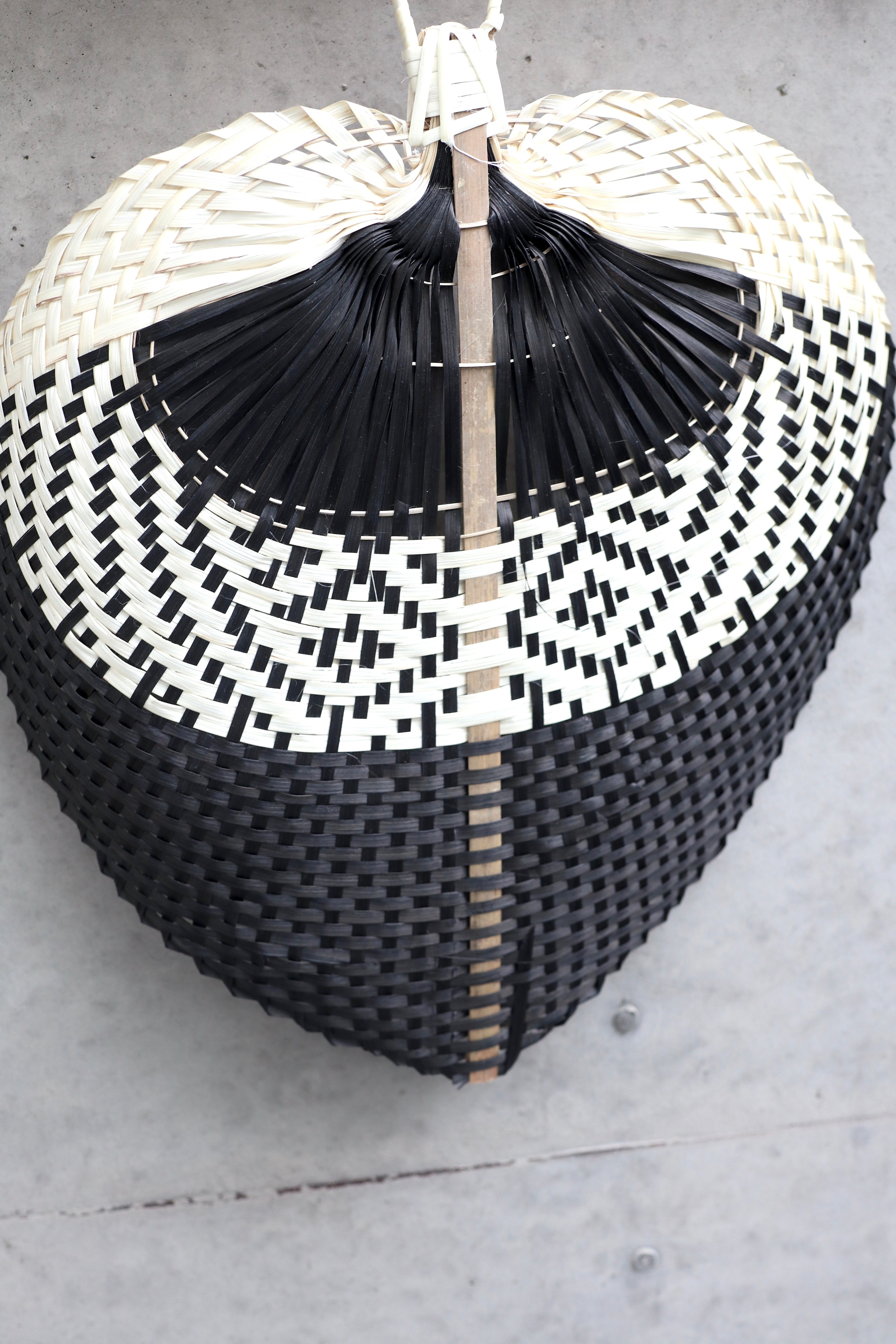 Hand-woven bamboo fan