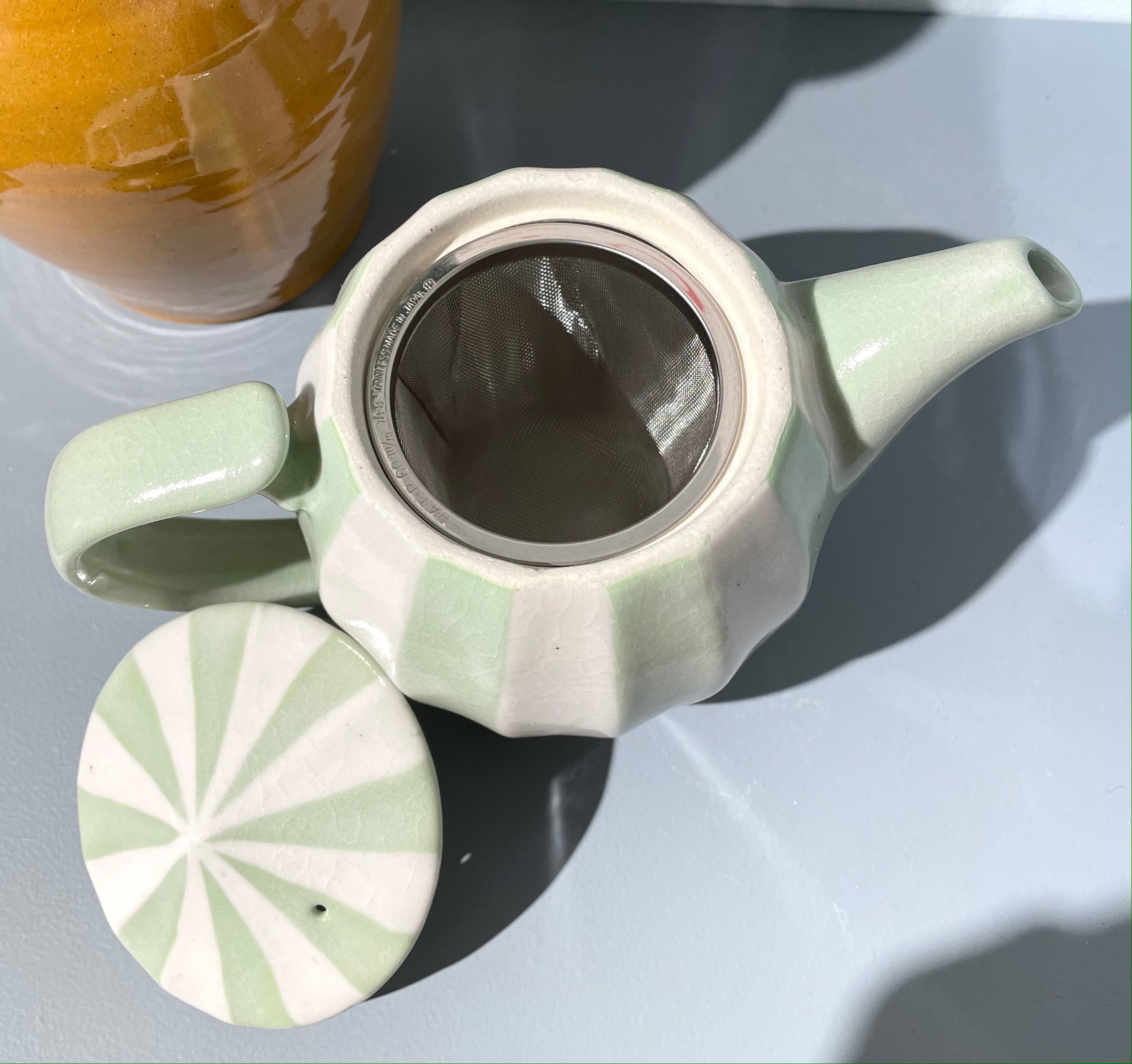 Japanese teapot with light green stripes