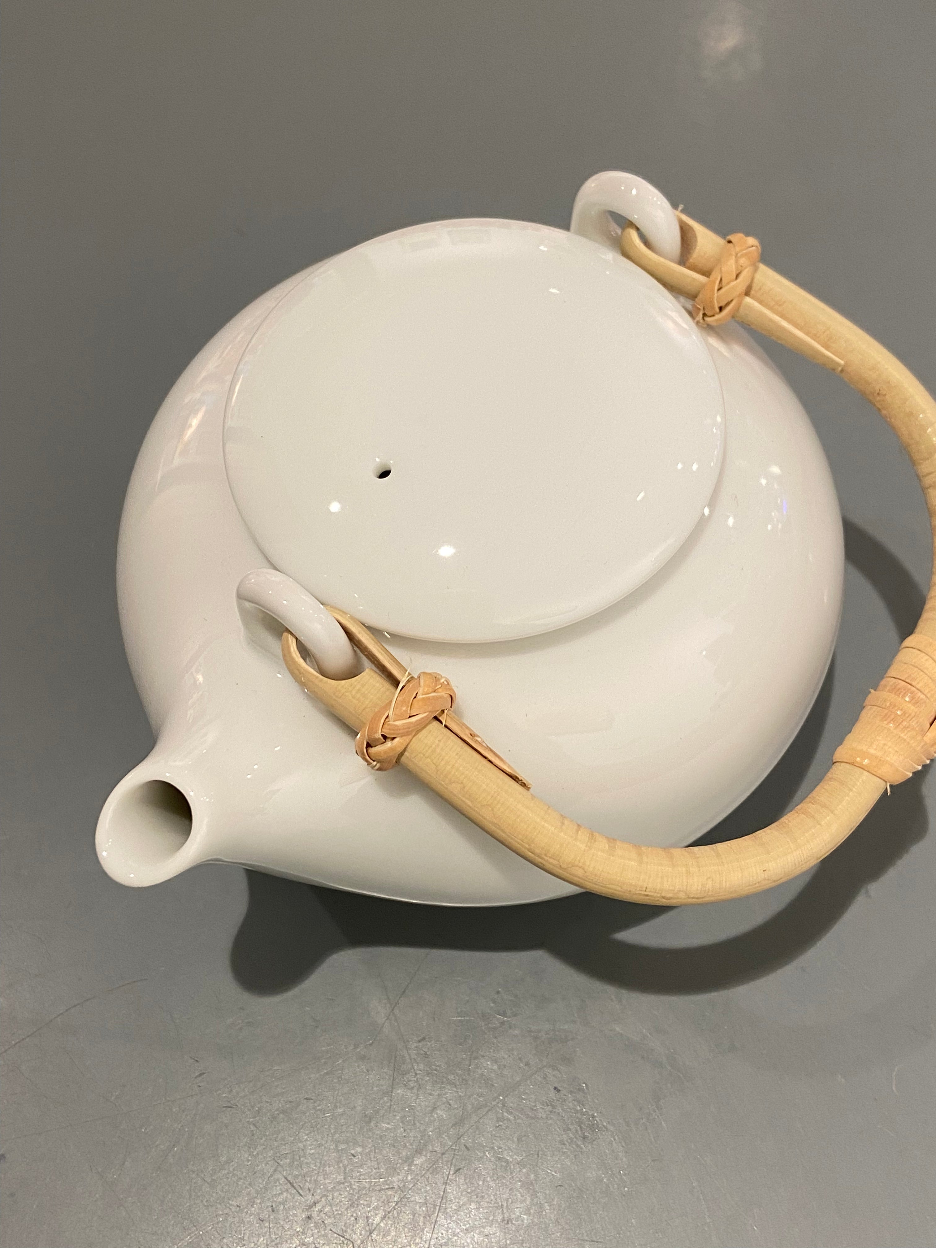 Small white teapot