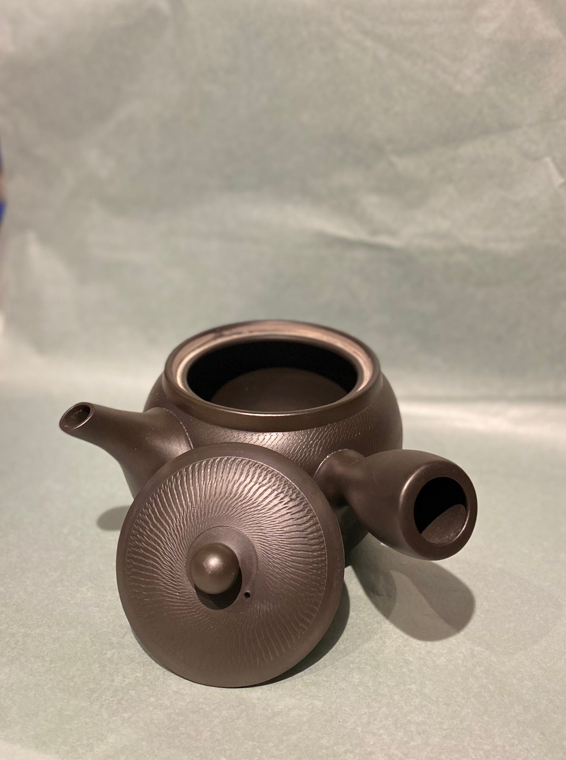 Large black/dark brown teapot with handle
