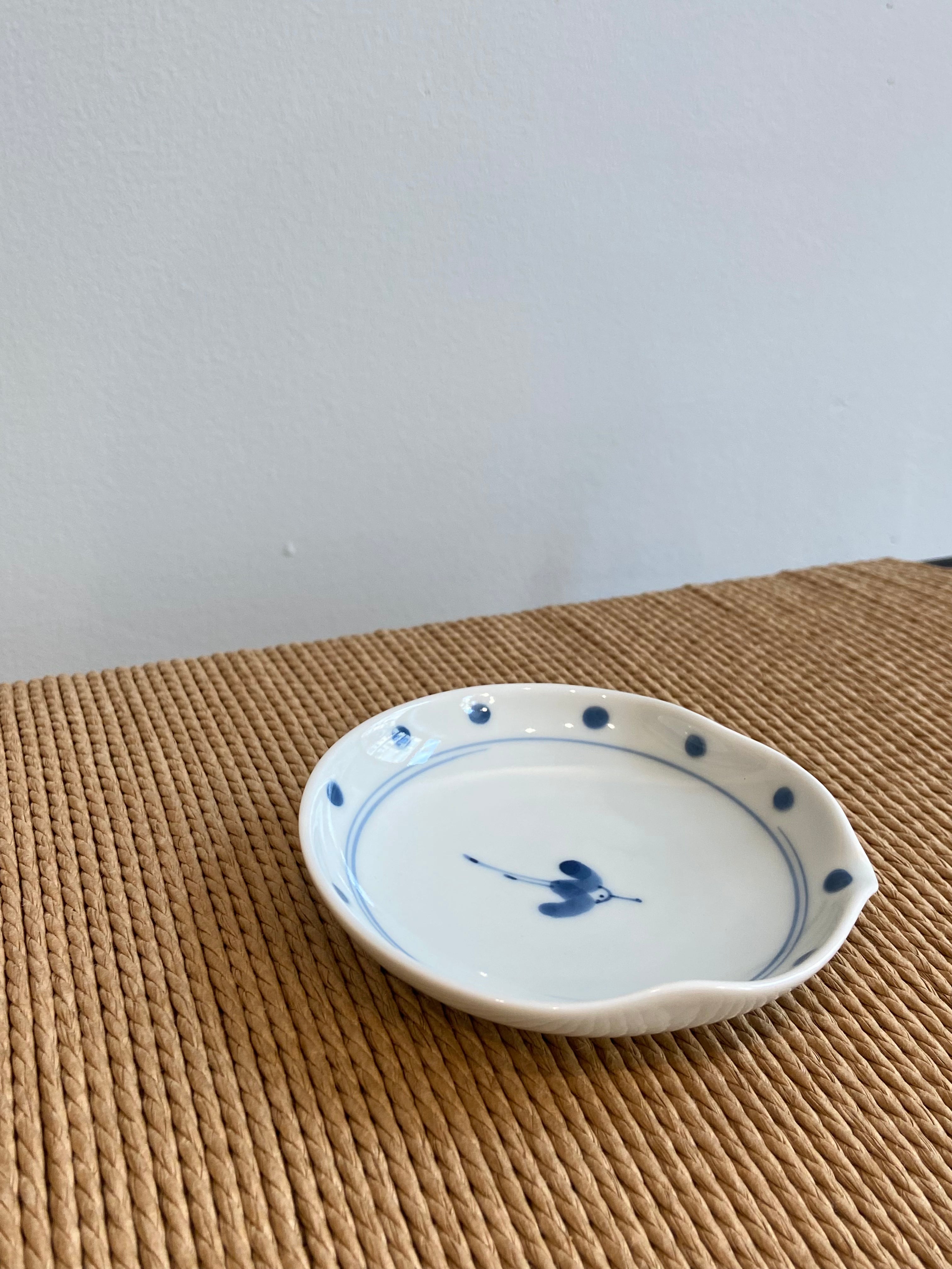 Small flat bowl with crane