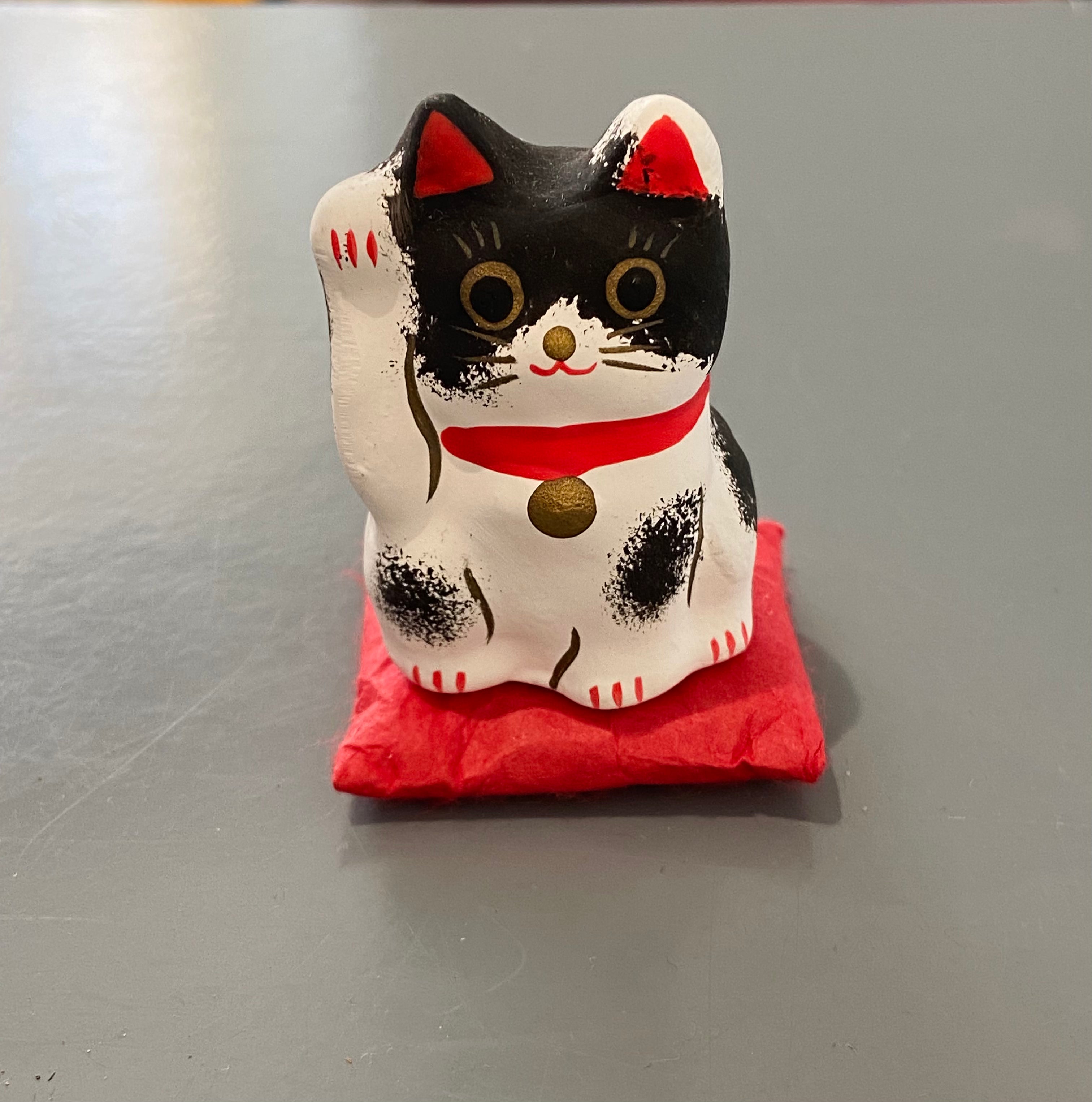 Lucky Cat on pillow, black and white