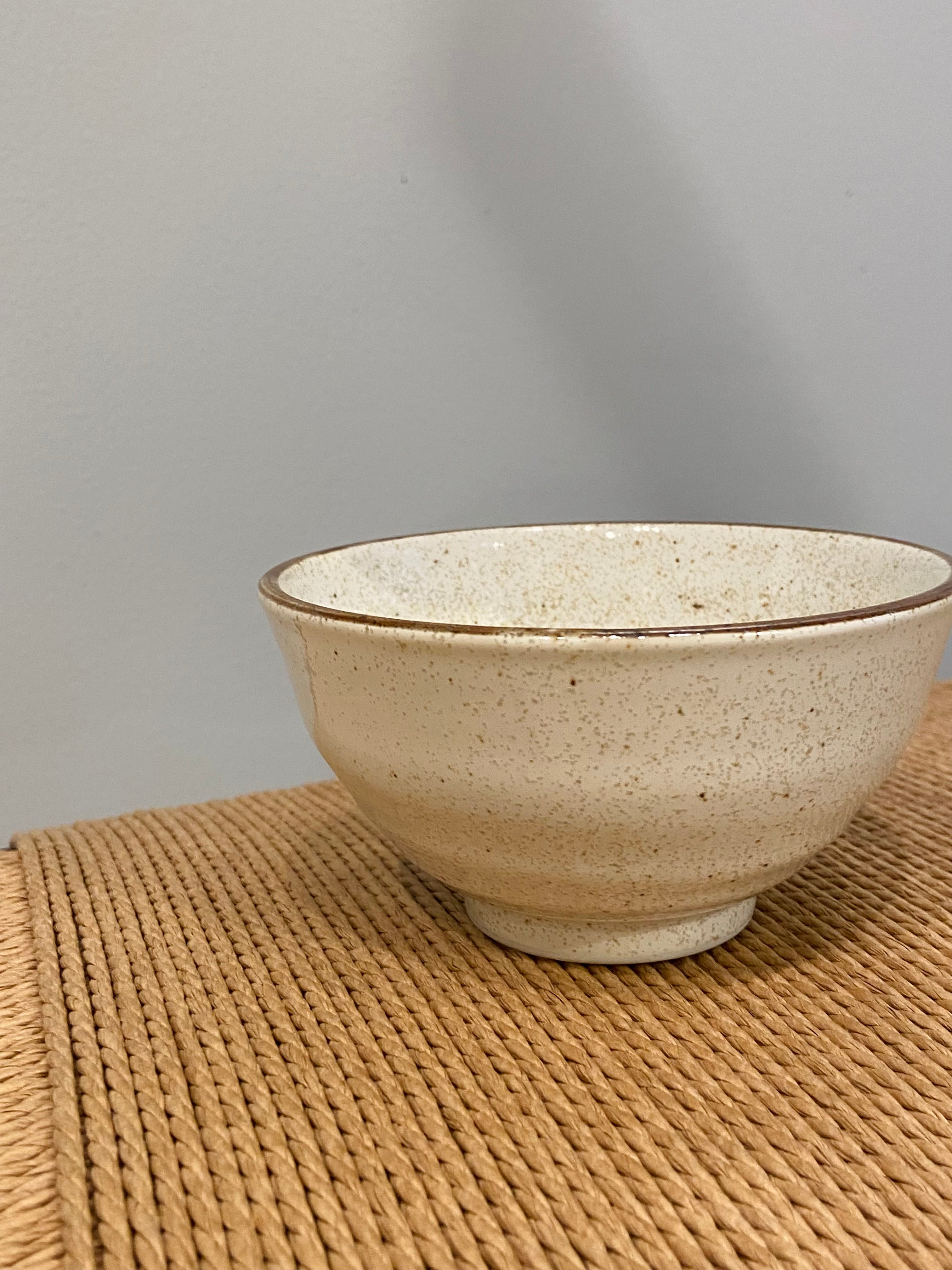 Cream colored ceramic bowl