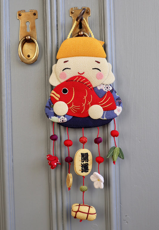Japansk ornament- Dreng med fisk