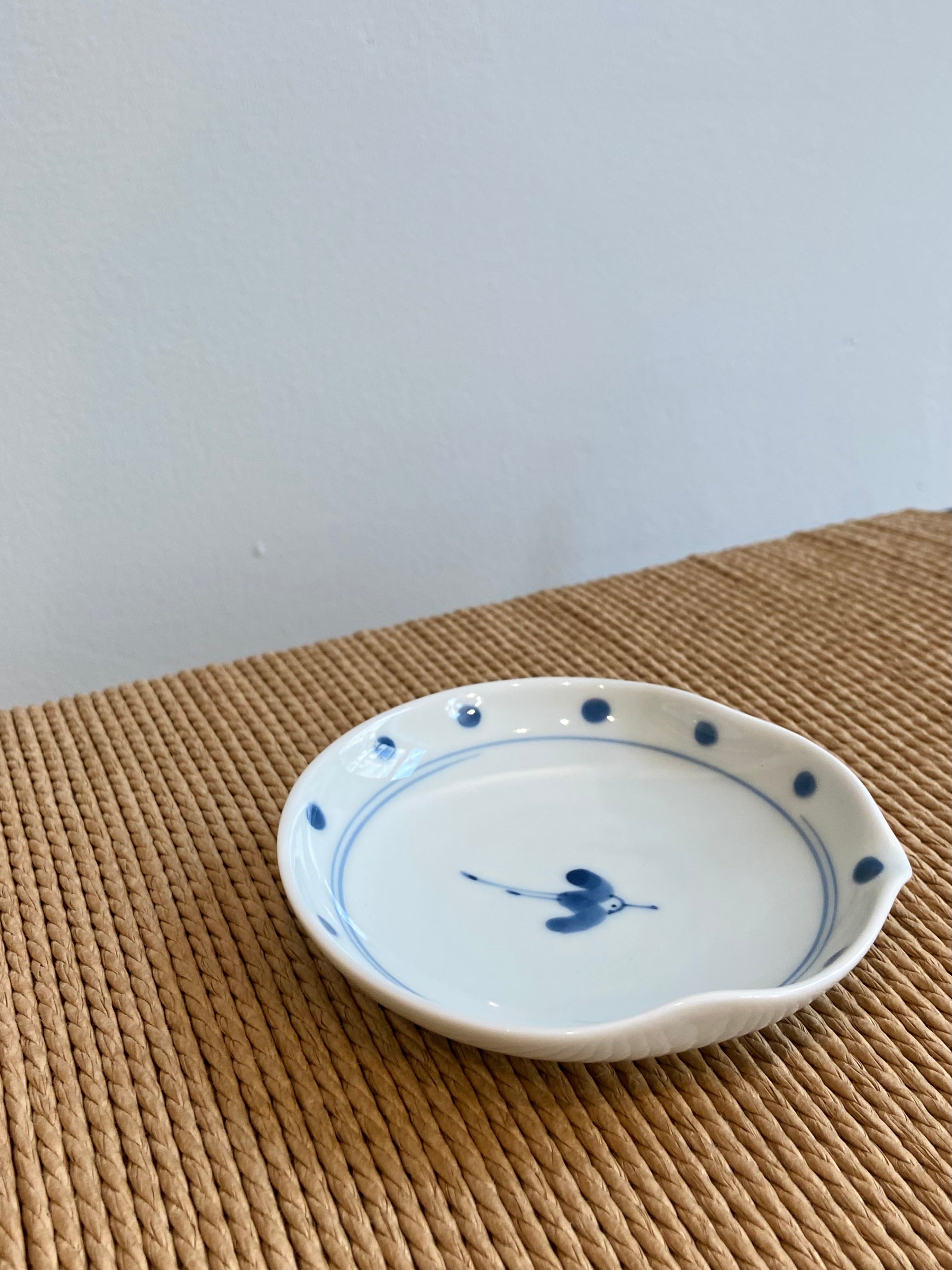 Small flat bowl with crane
