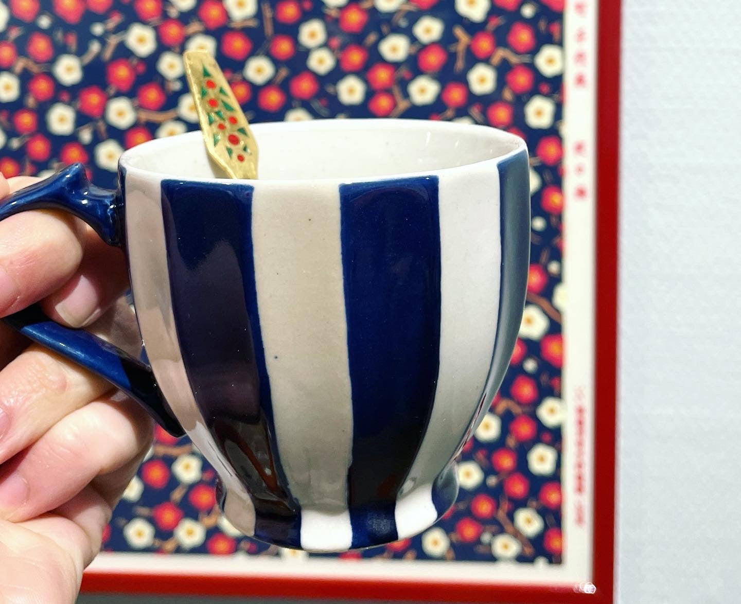 Japanese cup with dark blue stripes