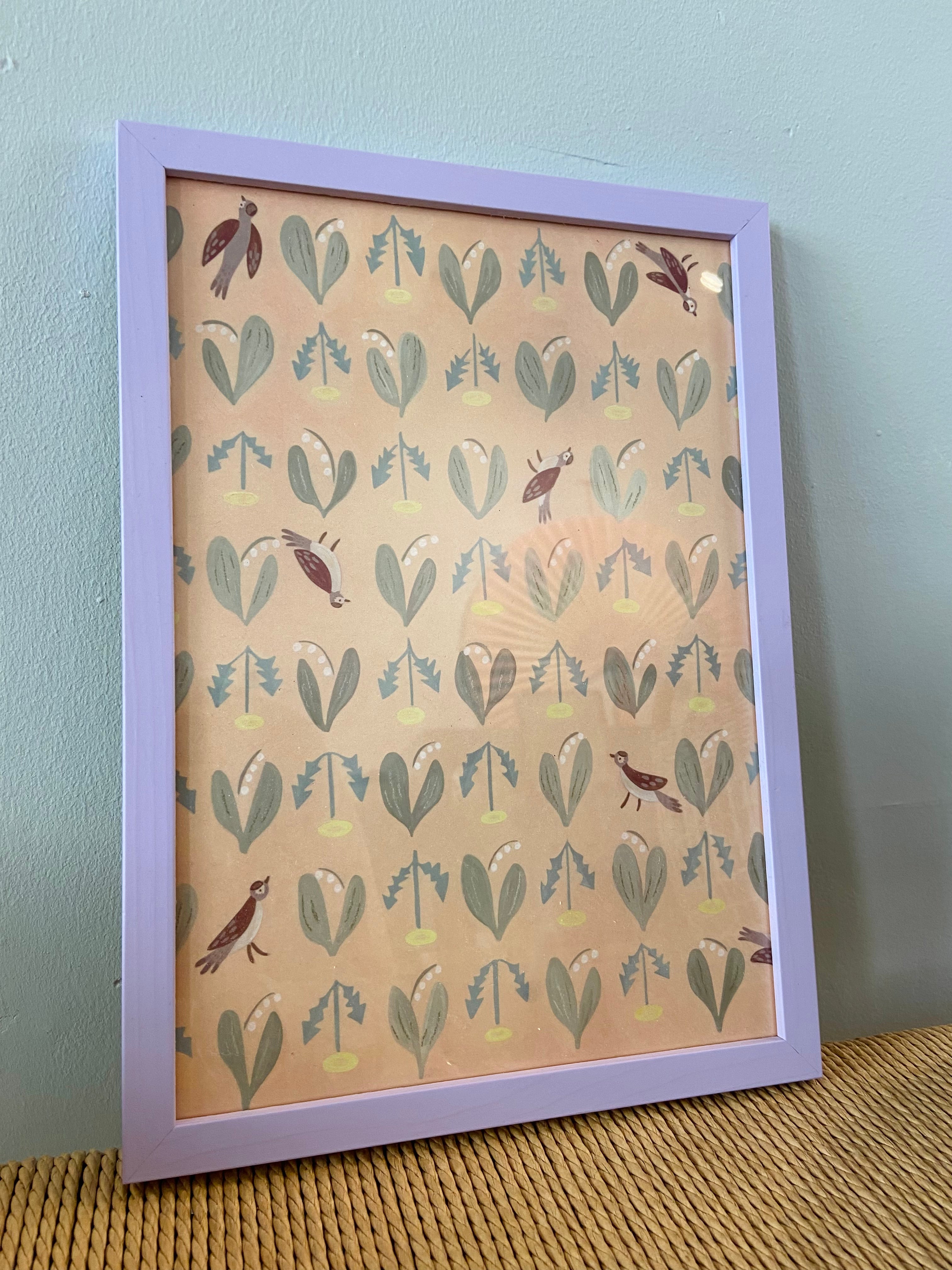 Birds and dandelions in lavender frame