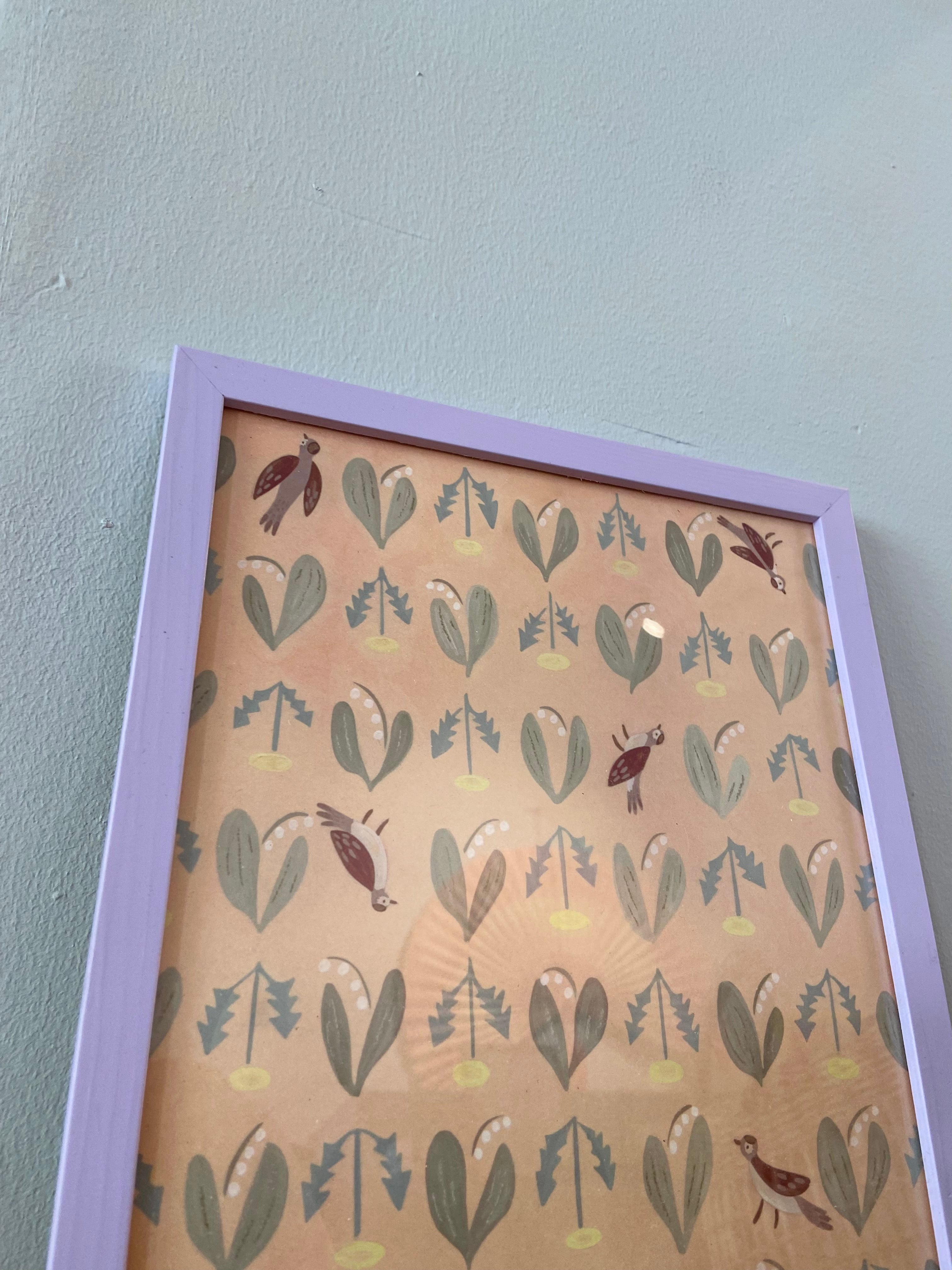 Birds and dandelions in lavender frame