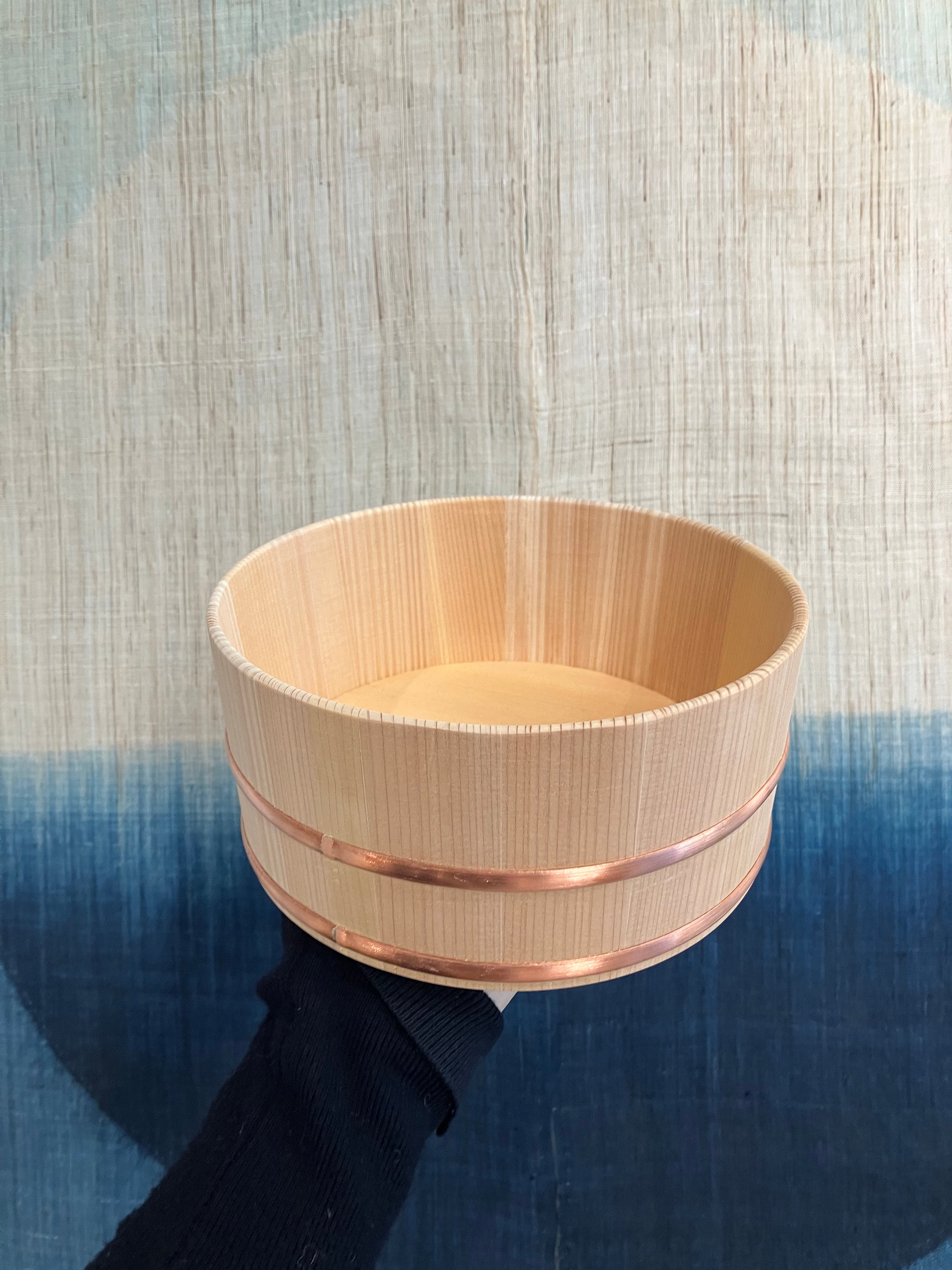 Small wooden tub with steel band