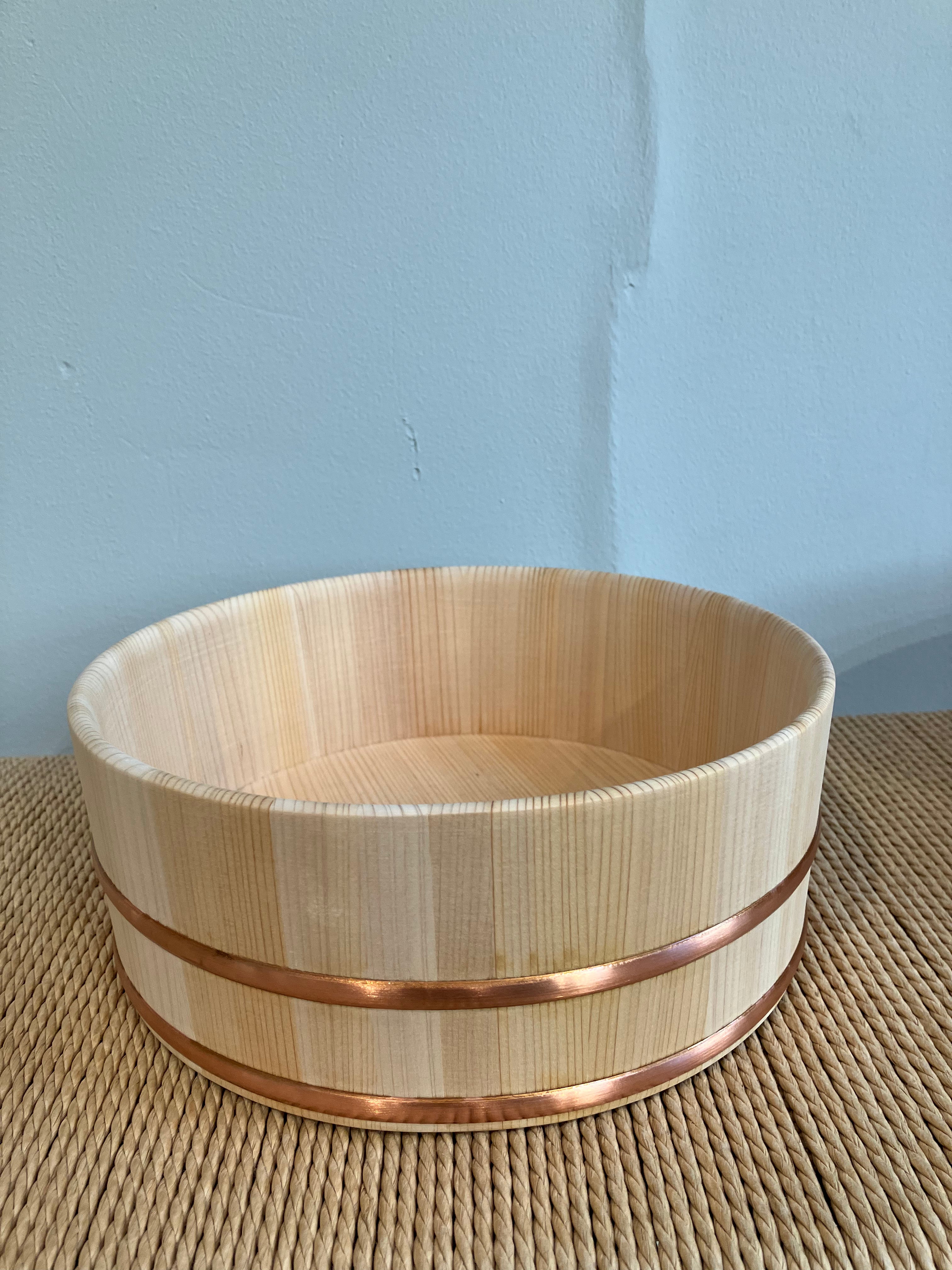 Large wooden tub with steel band