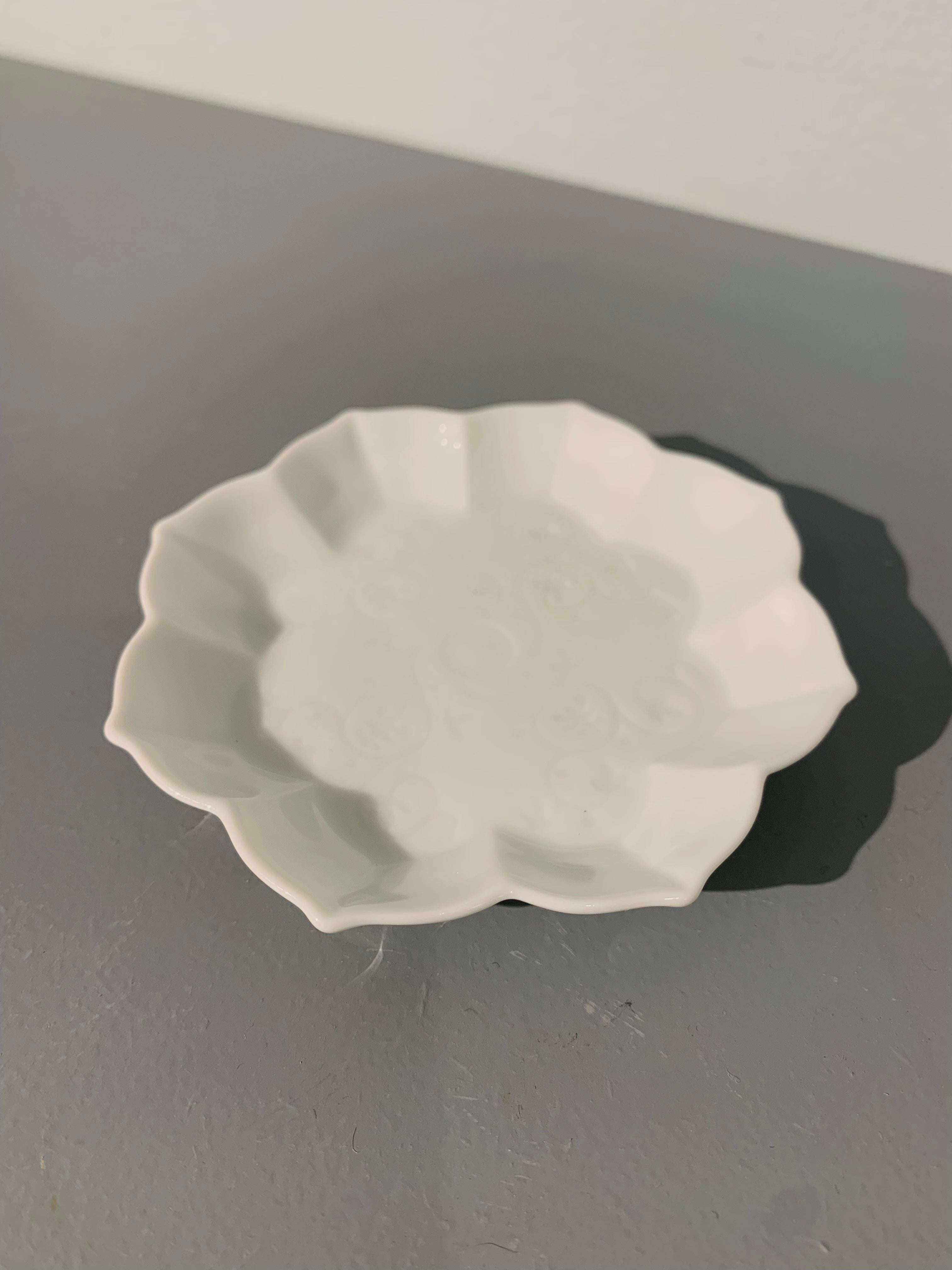 Small white bowl with floral motif