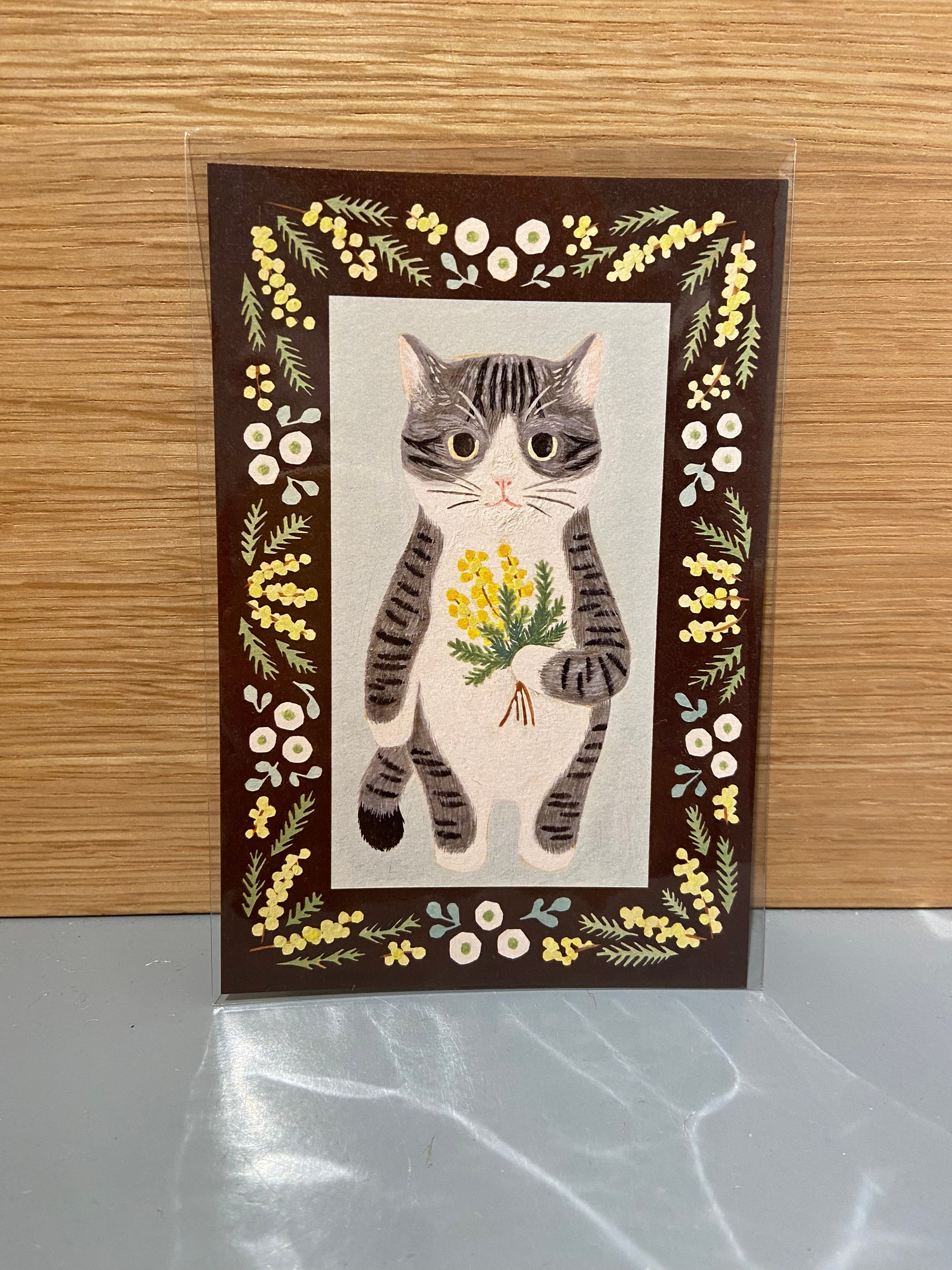 Japanese card with cat with yellow bouquet, brown