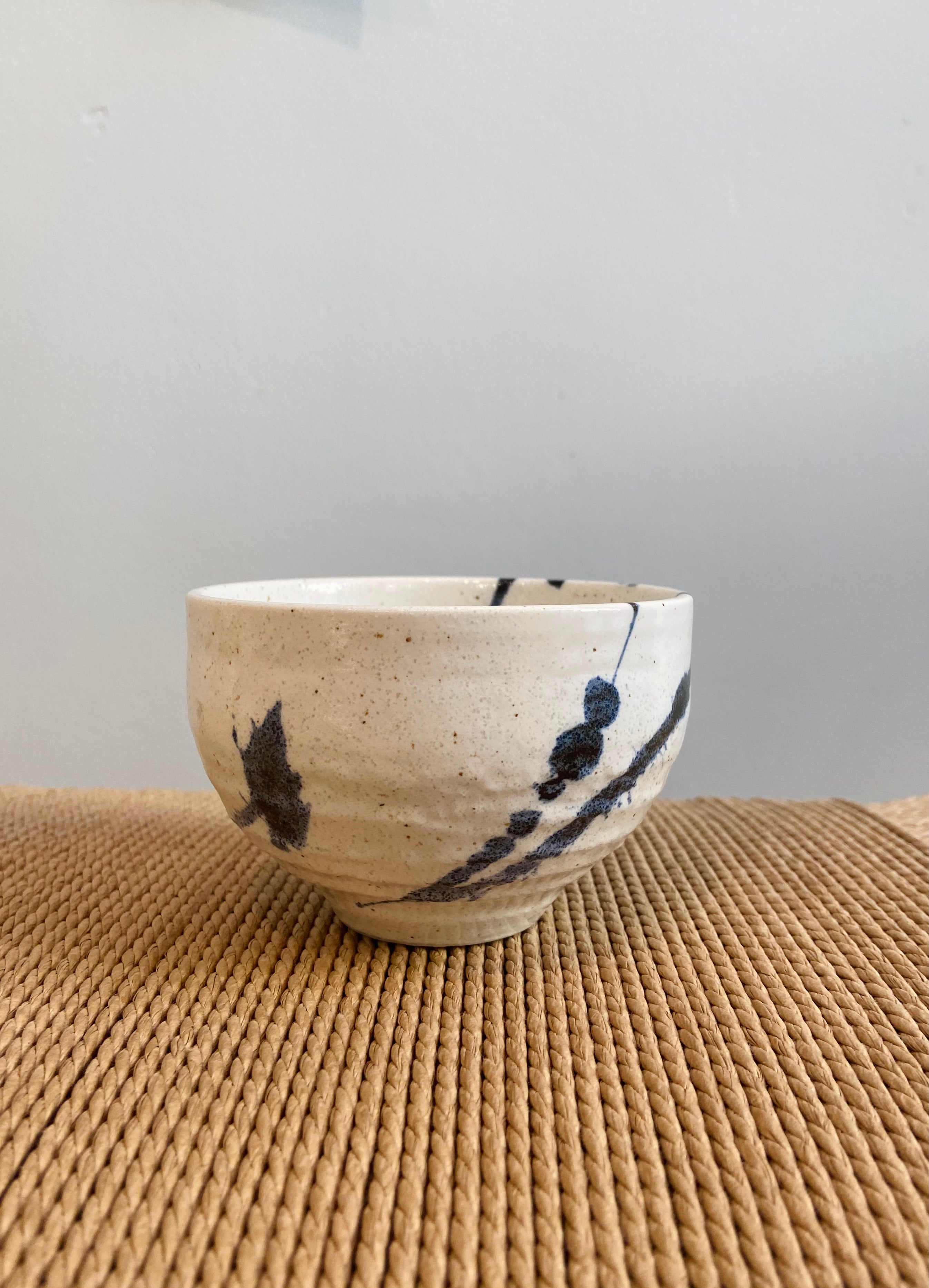 Japanese cup with blue splash pattern