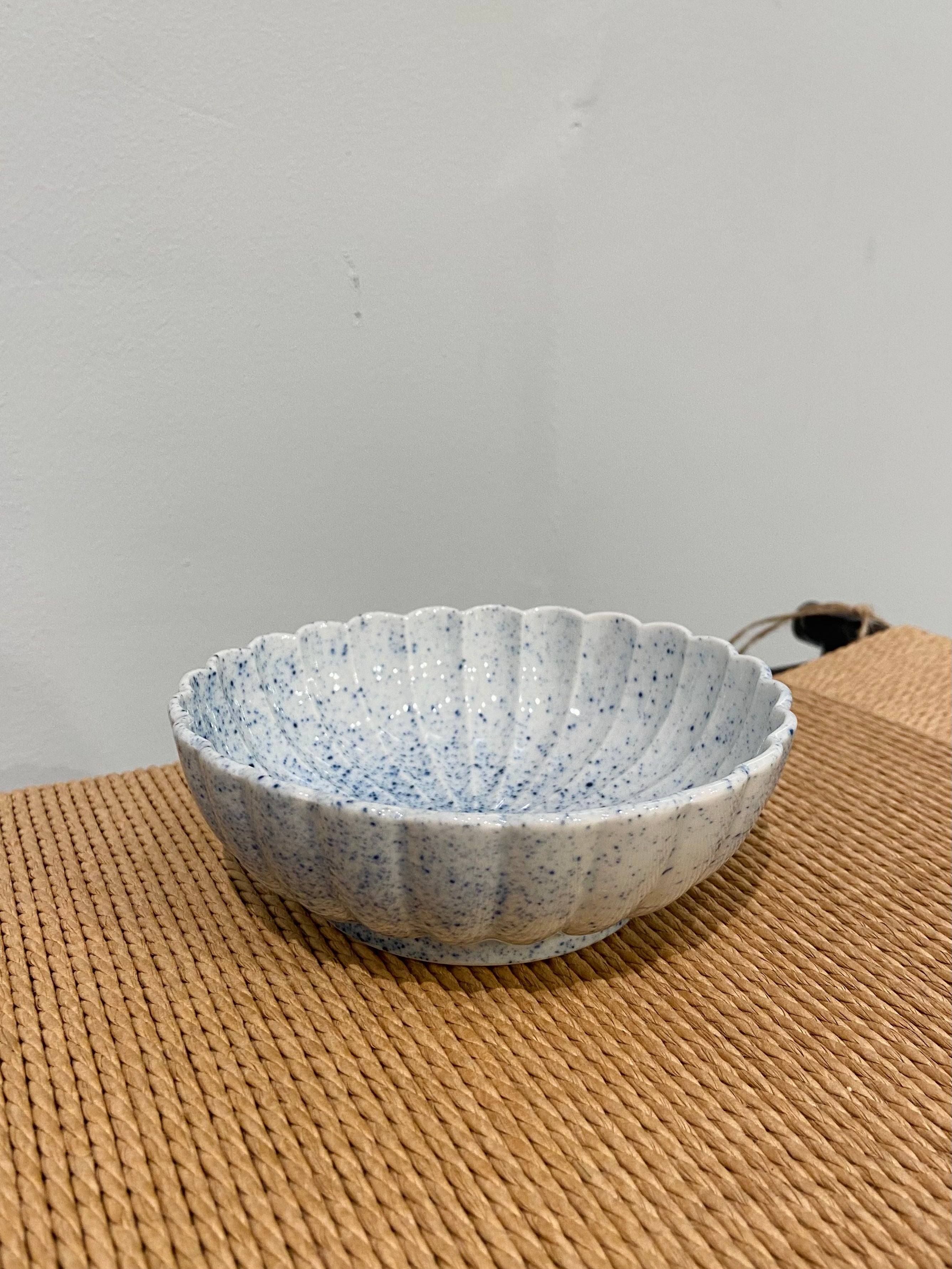 Large flower bowl with blue splash