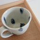 Japansk kop med blå pletter og hank
