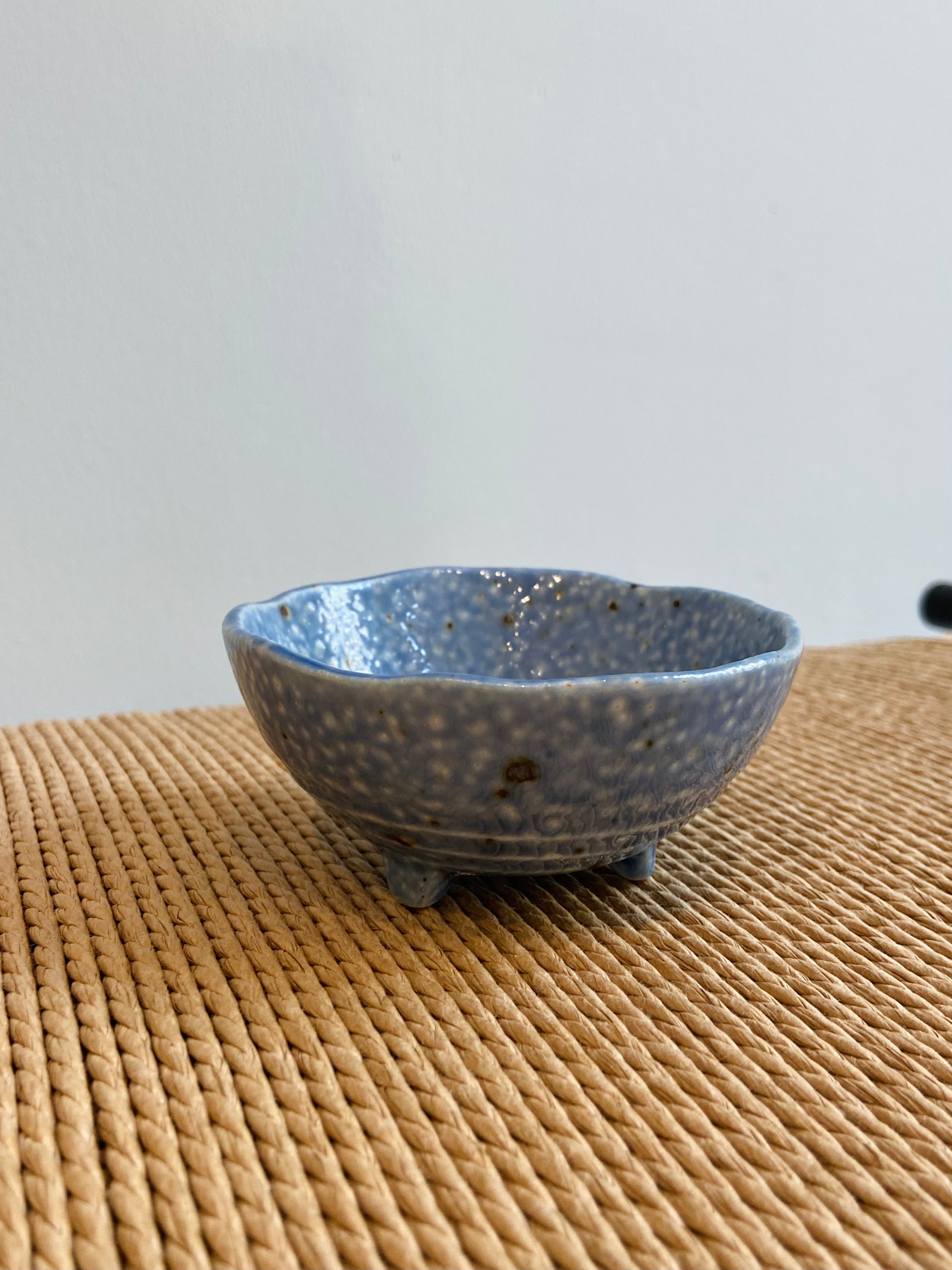 Light blue bowl with three feet