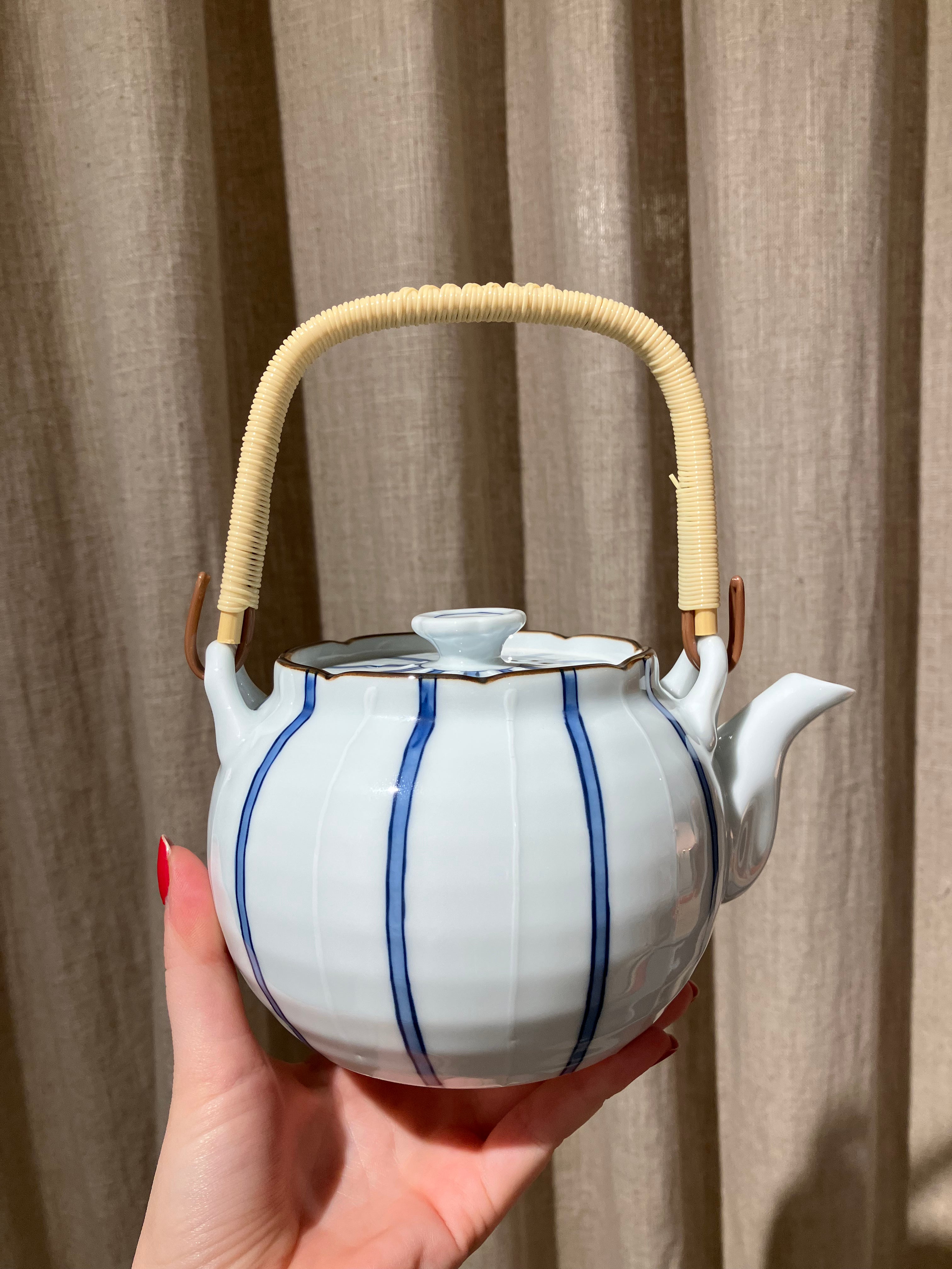 Teapot with blue stripes and handle