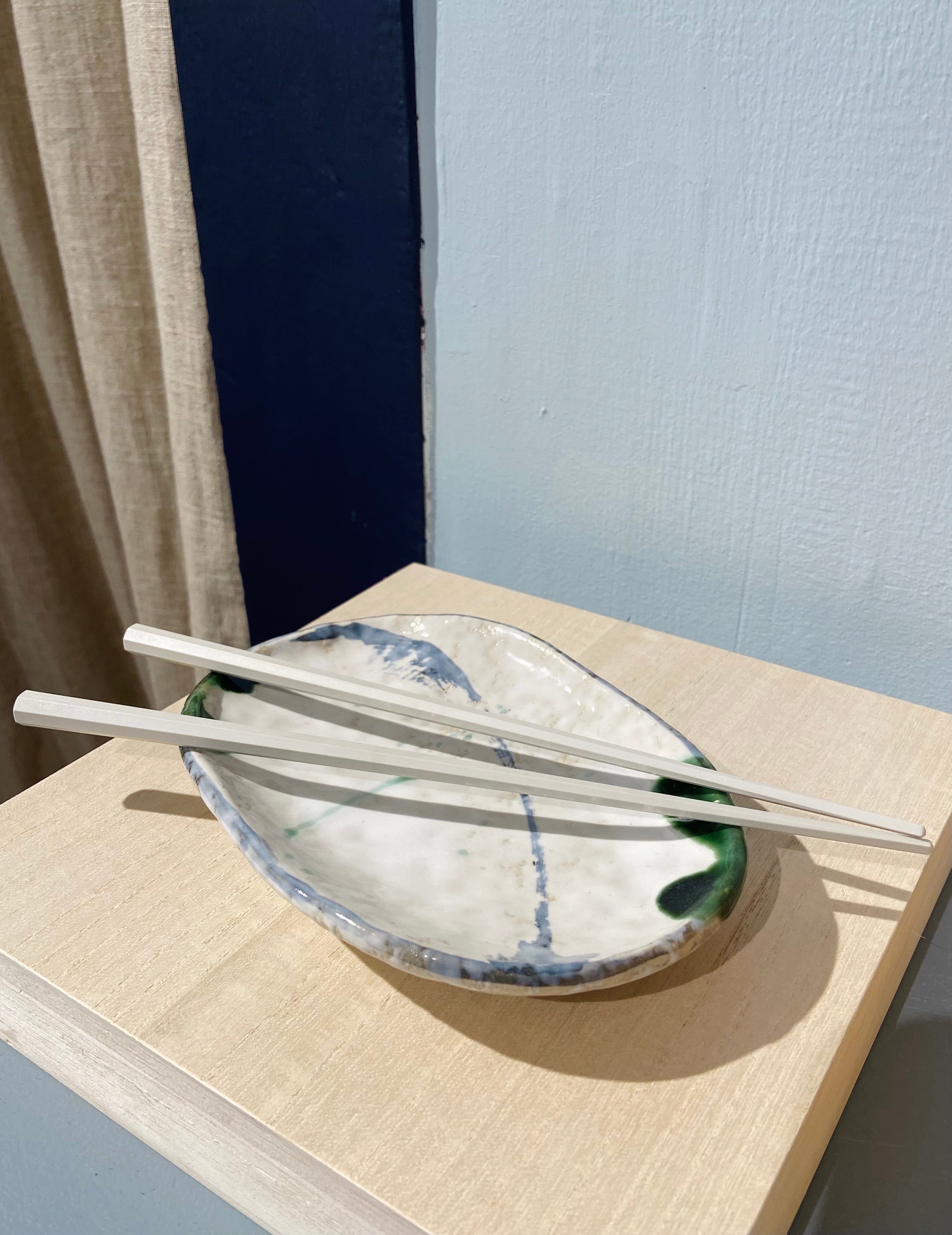 Japanese dish with blue and green pattern, small