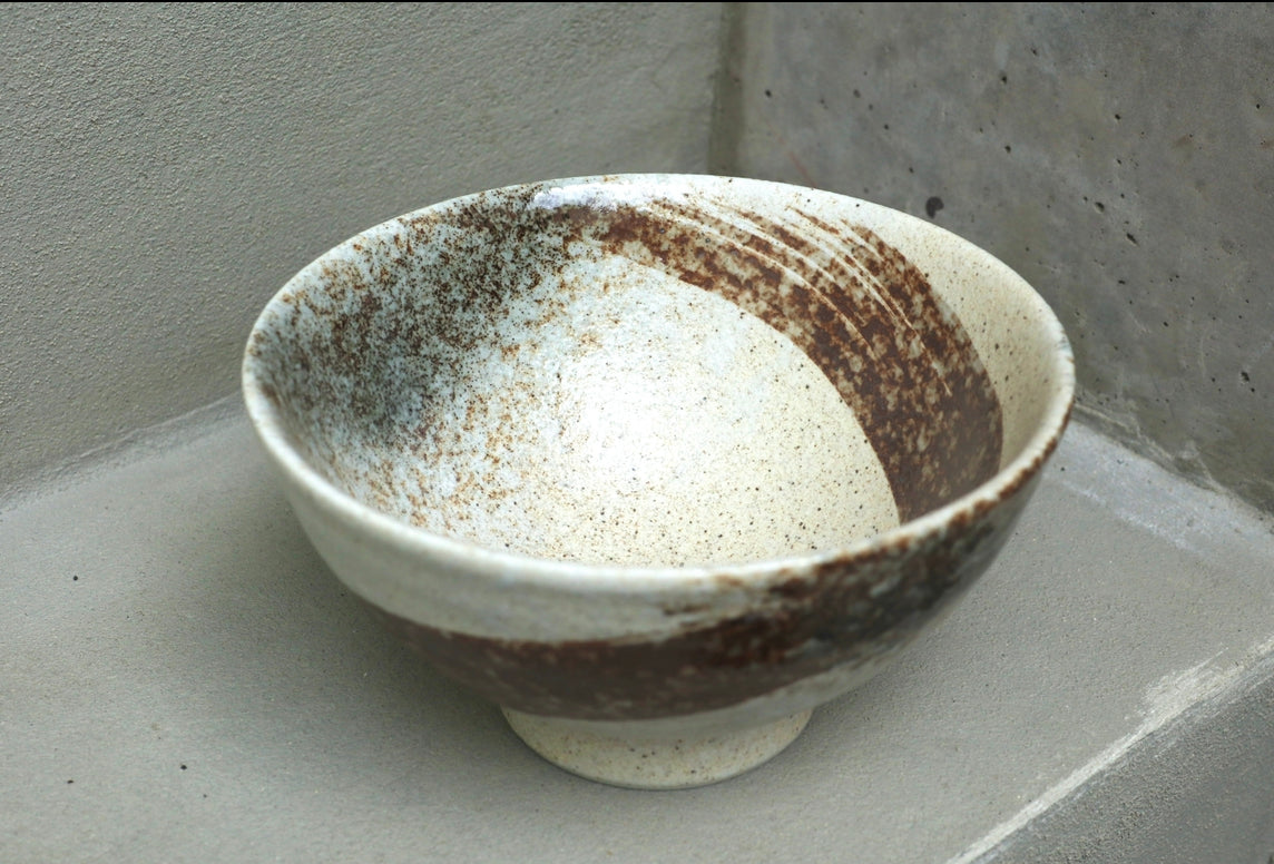Noodle bowl with brown brushstroke