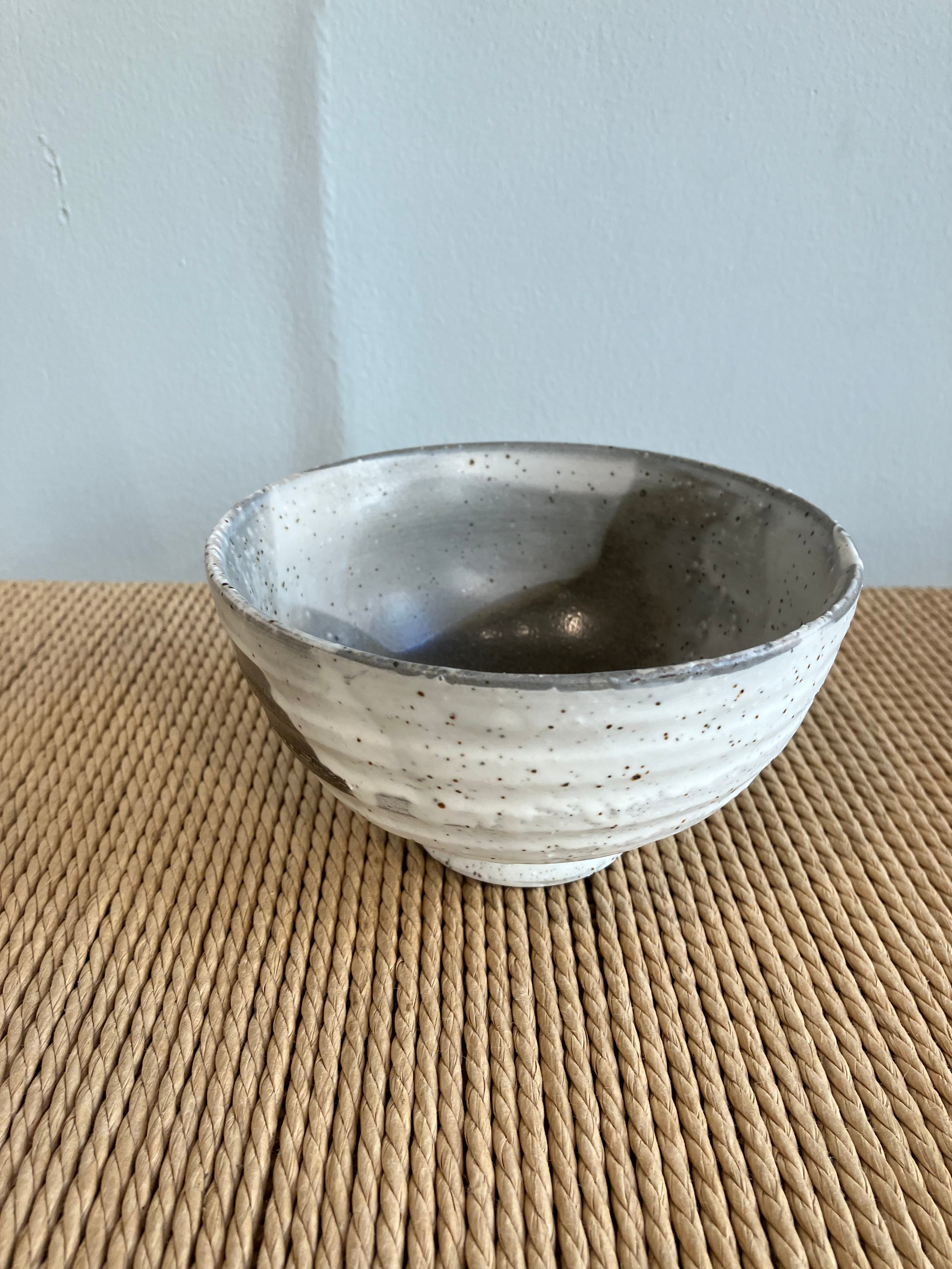 Bowl with gray glaze and dark details