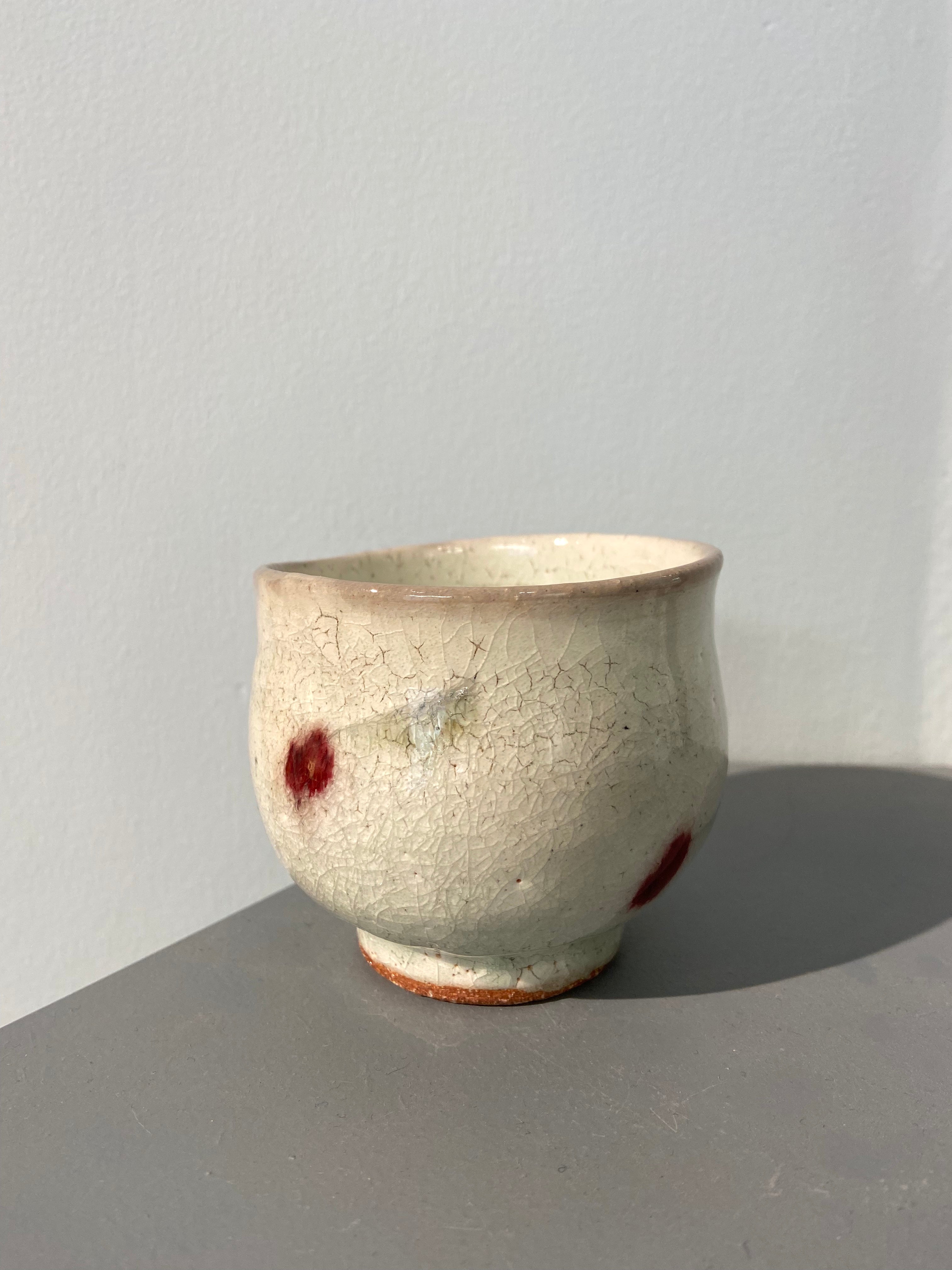Japanese cup with cherry