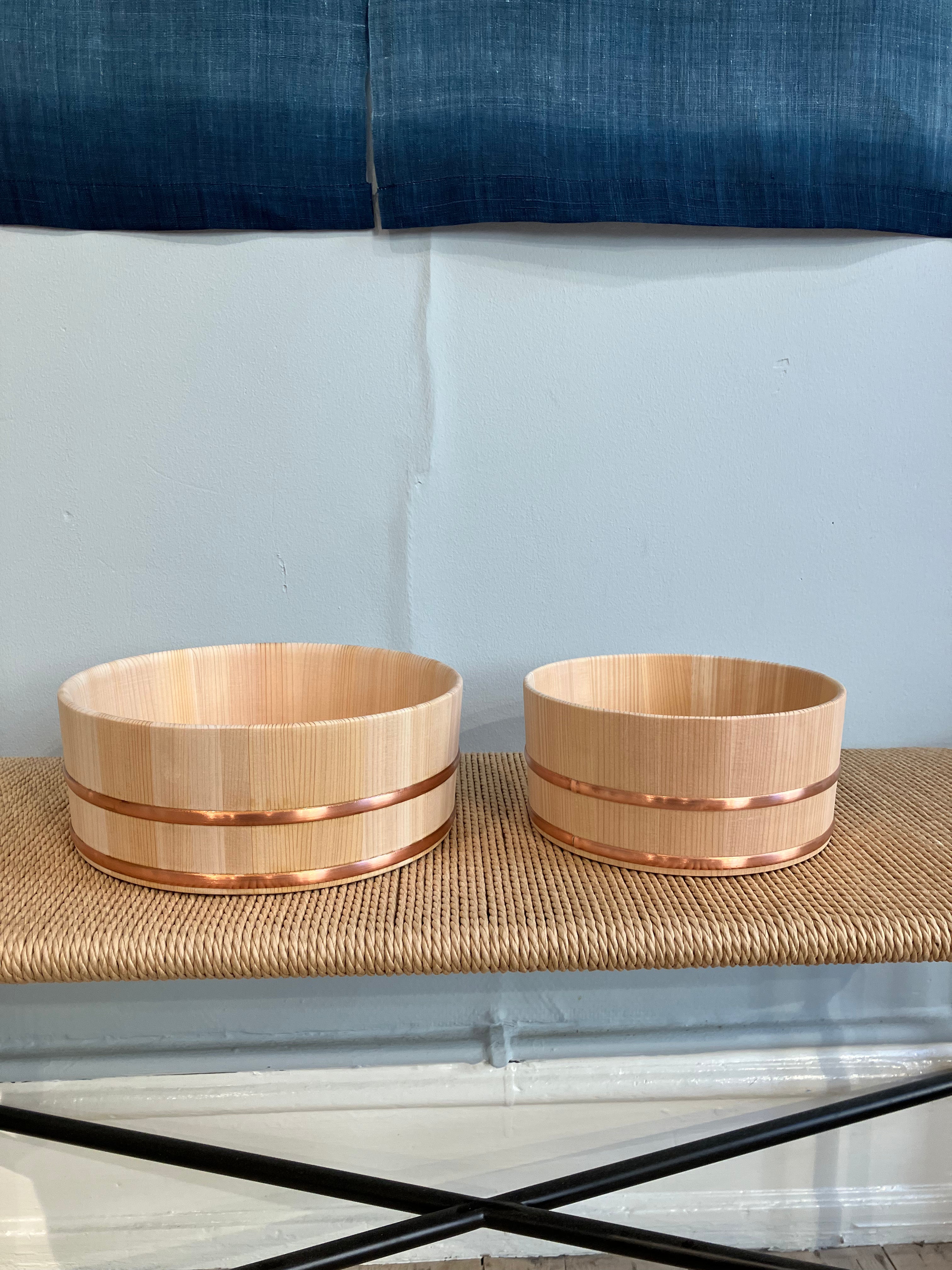 Large wooden tub with steel band