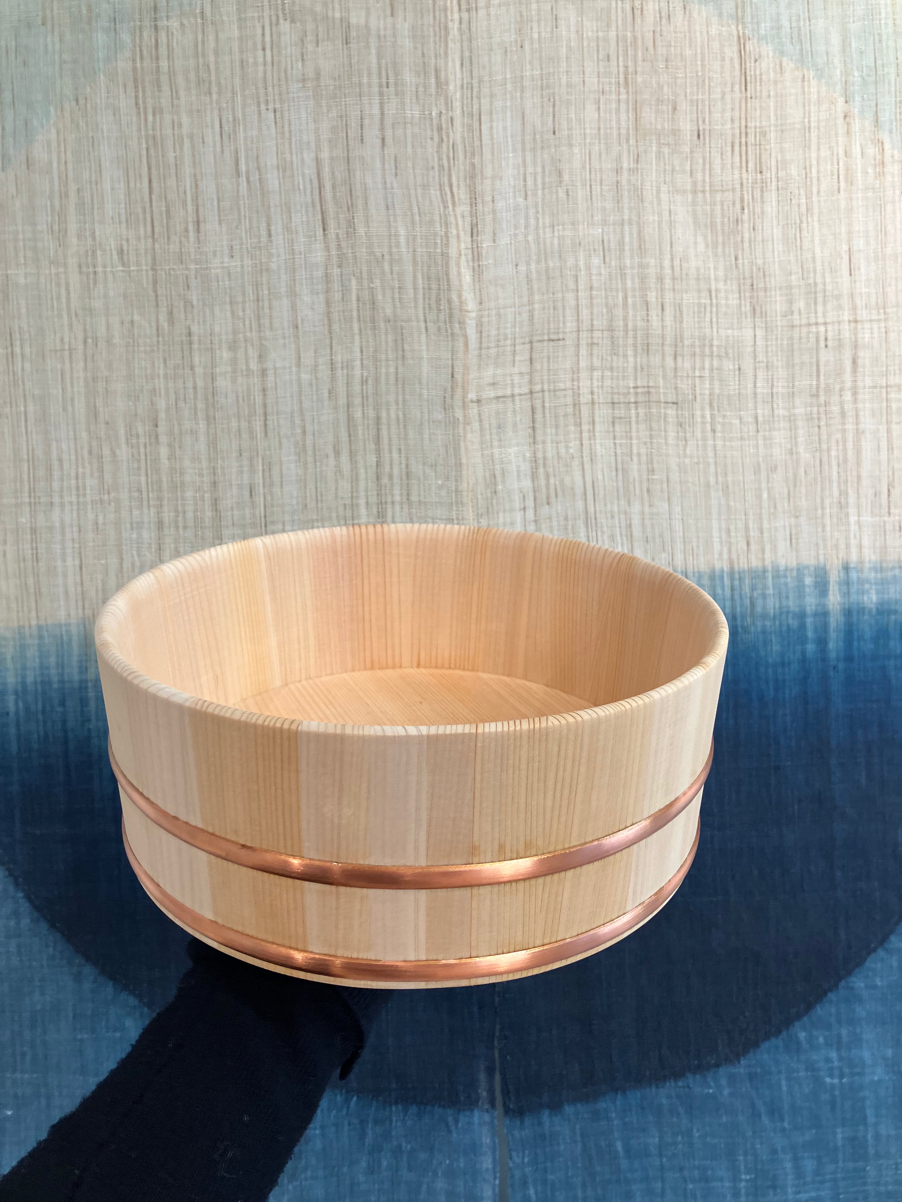 Large wooden tub with steel band