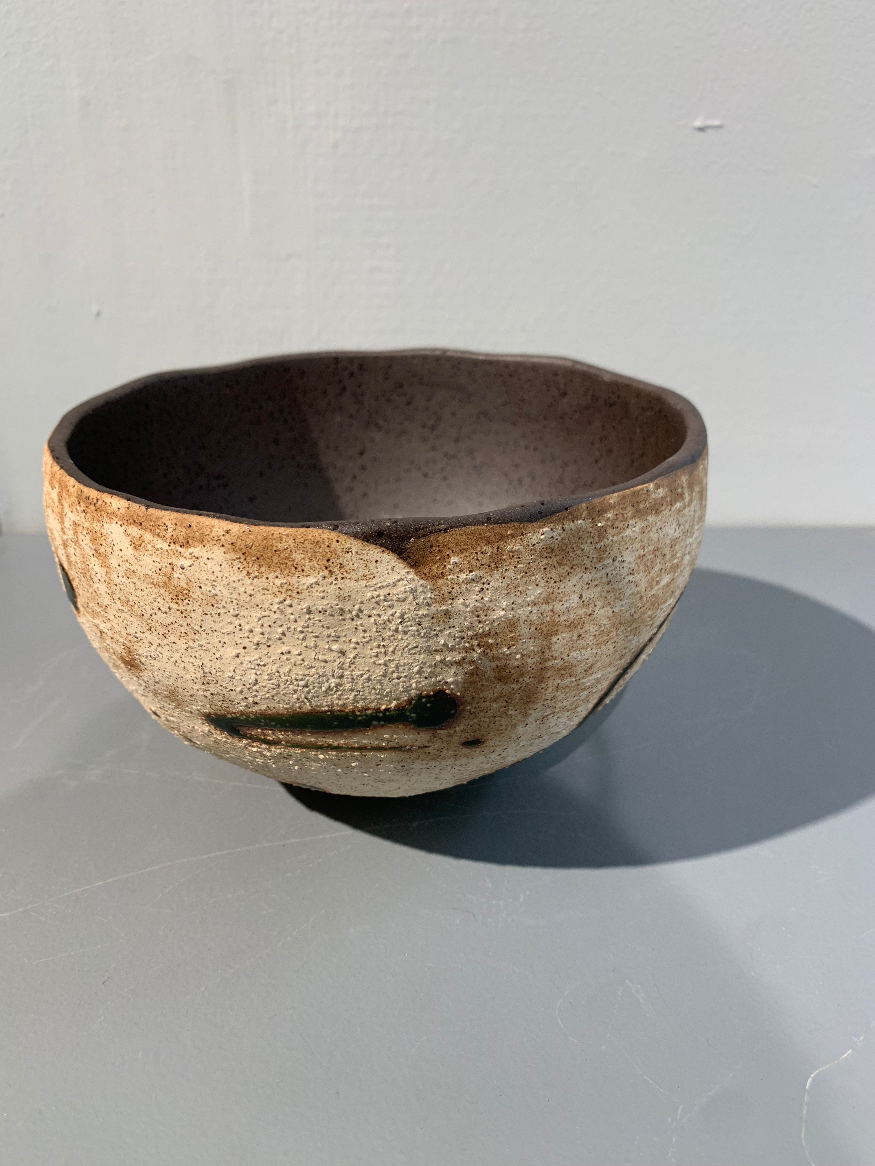 Brown noodle bowl with rough surface