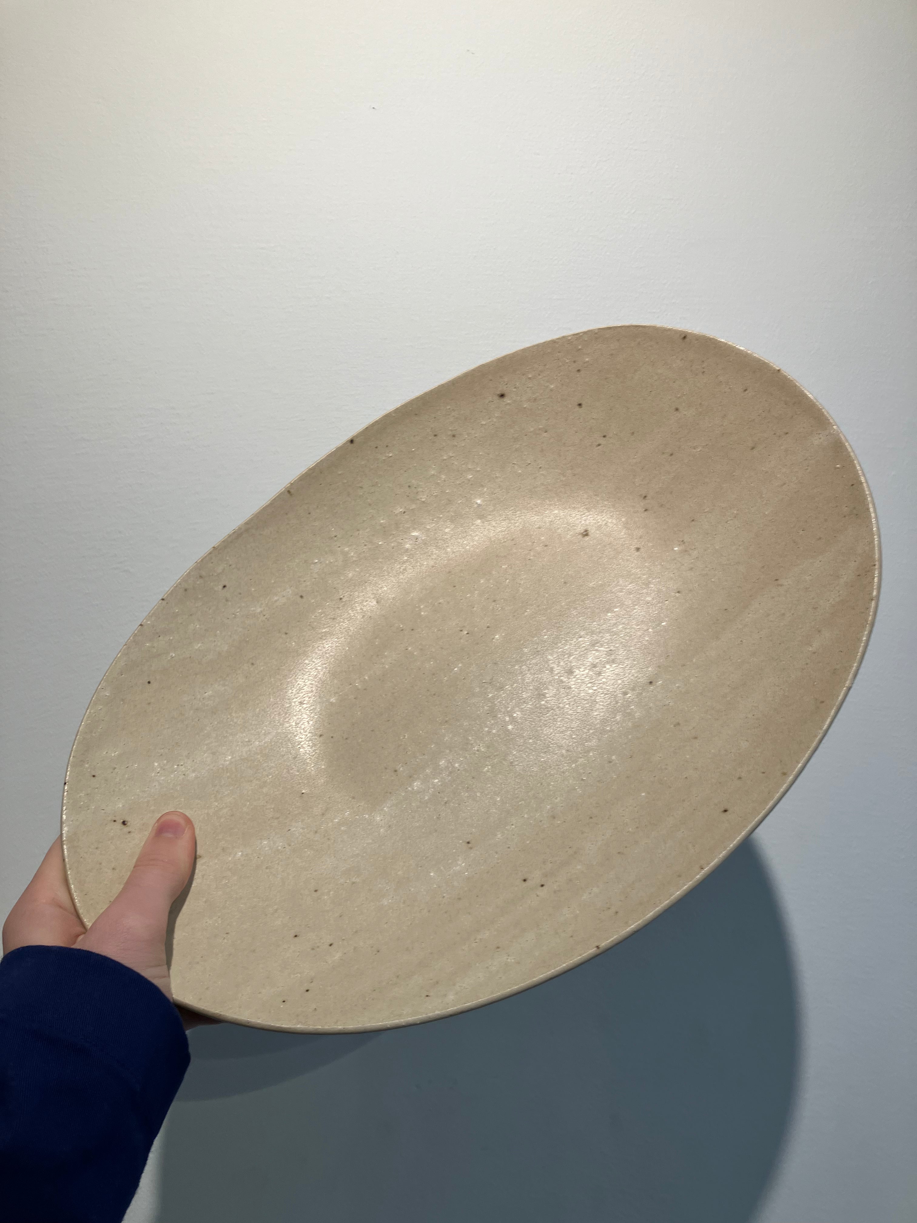 Oval dish with sand colored glaze