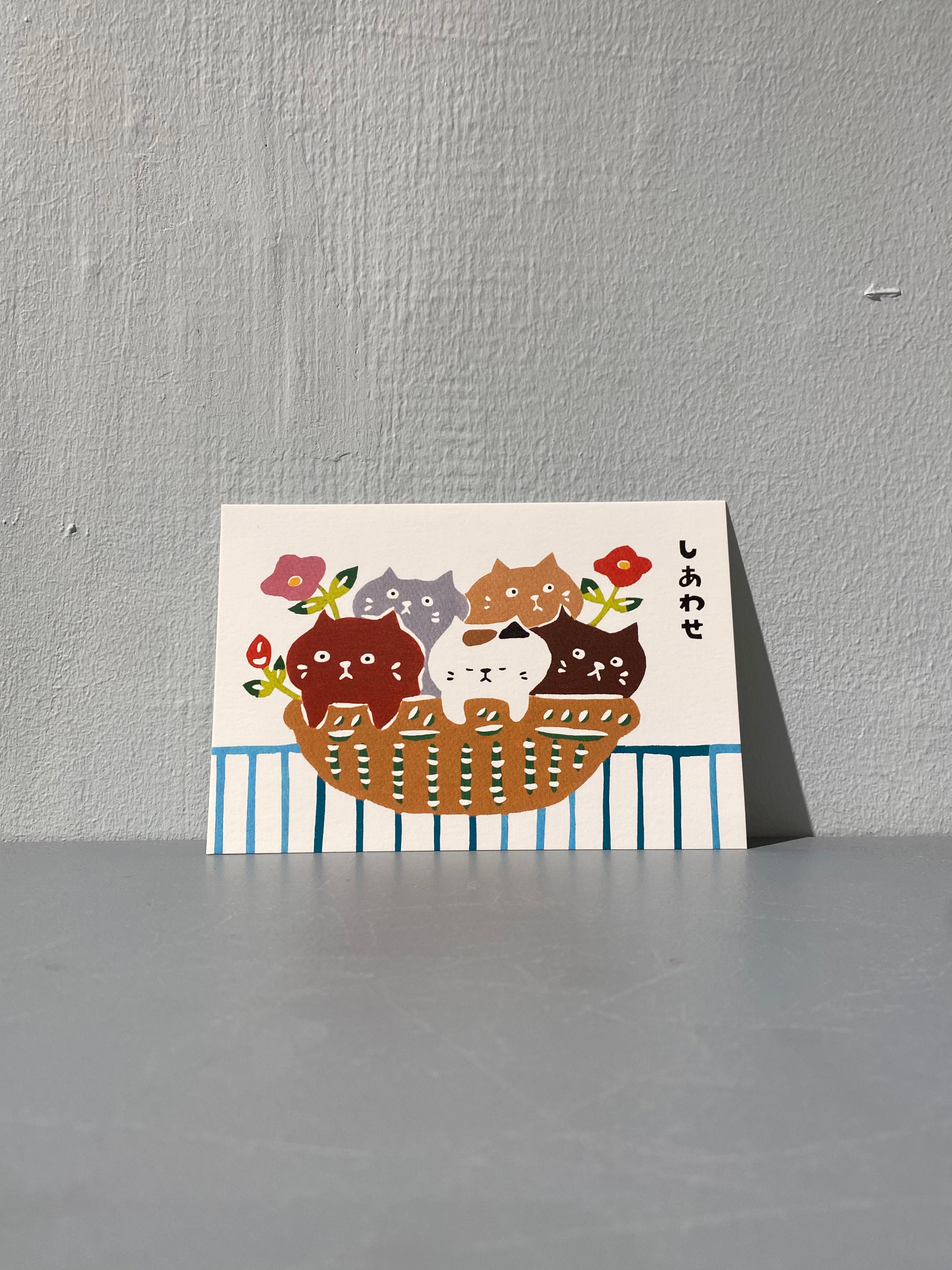 Postcard - cats in a wicker basket