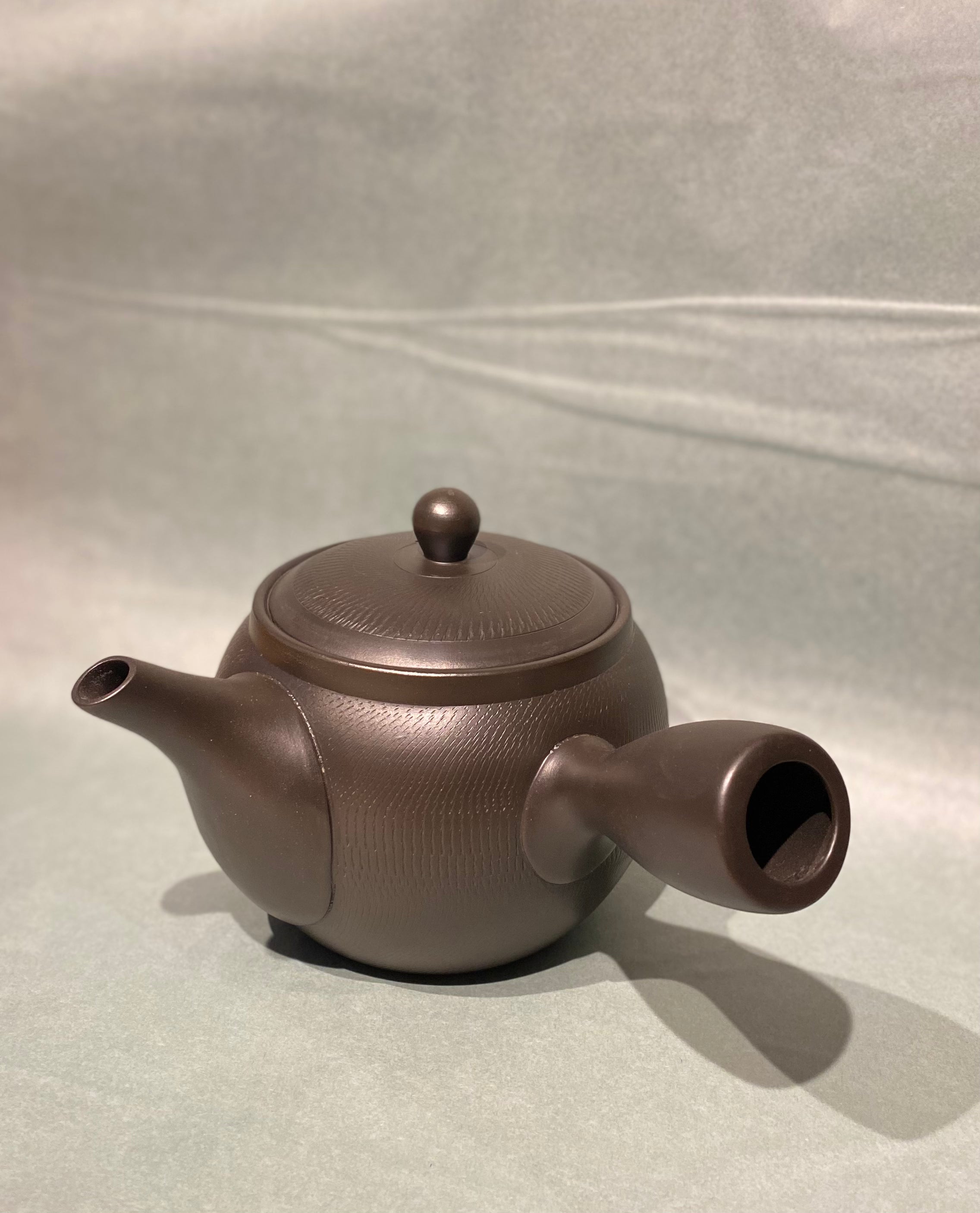 Large black/dark brown teapot with handle