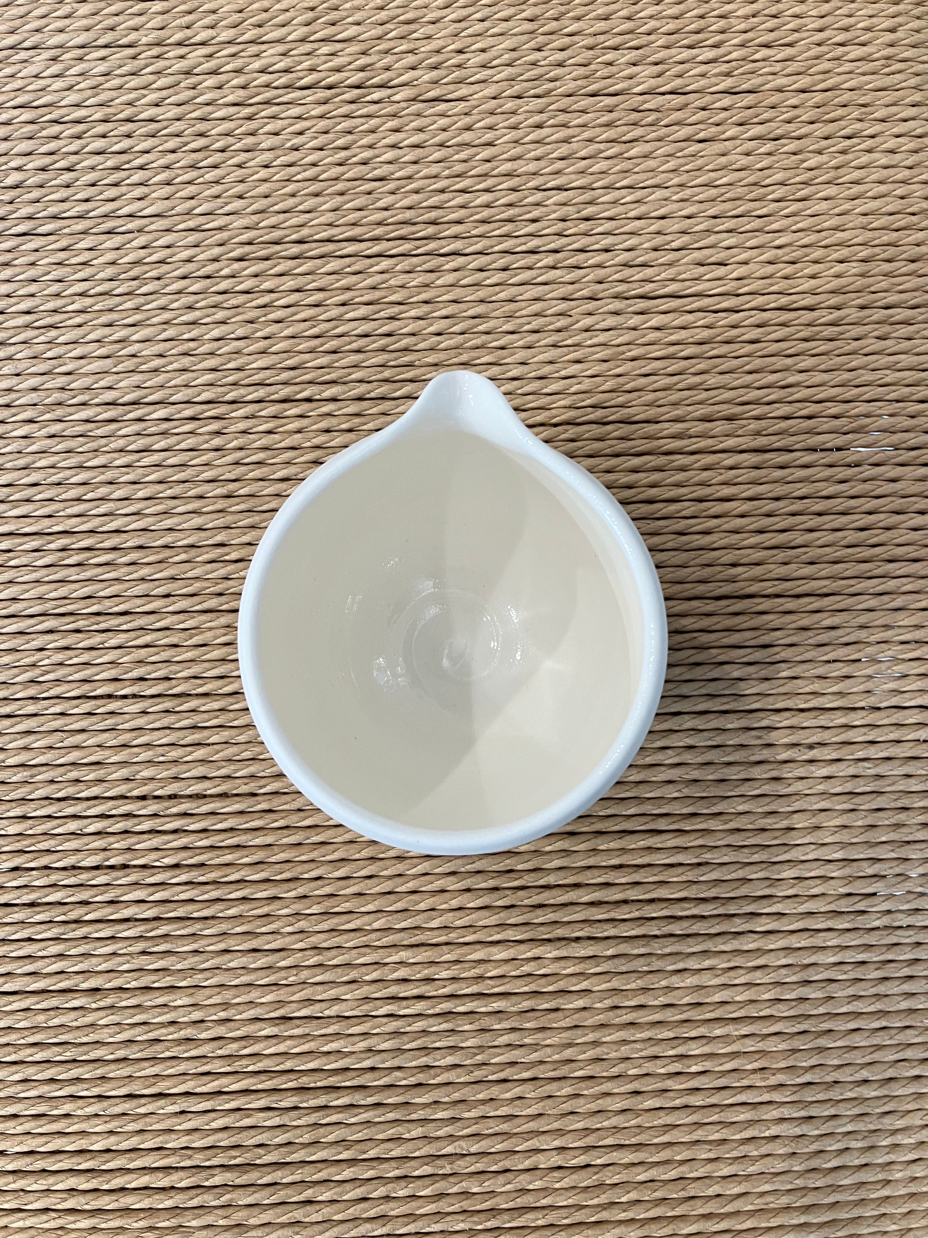Handmade, white ceramic jug in matt glaze