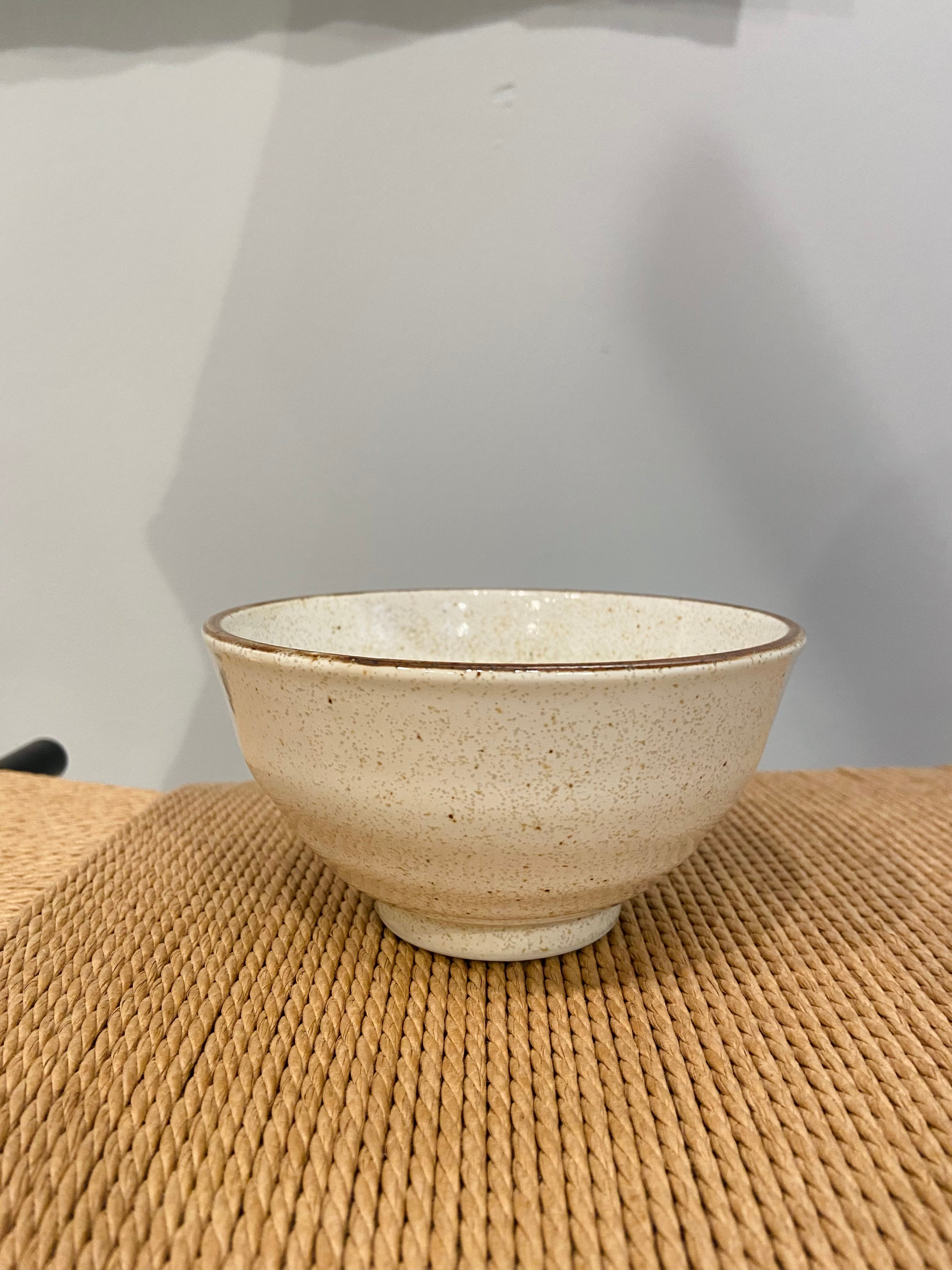 Cream colored ceramic bowl