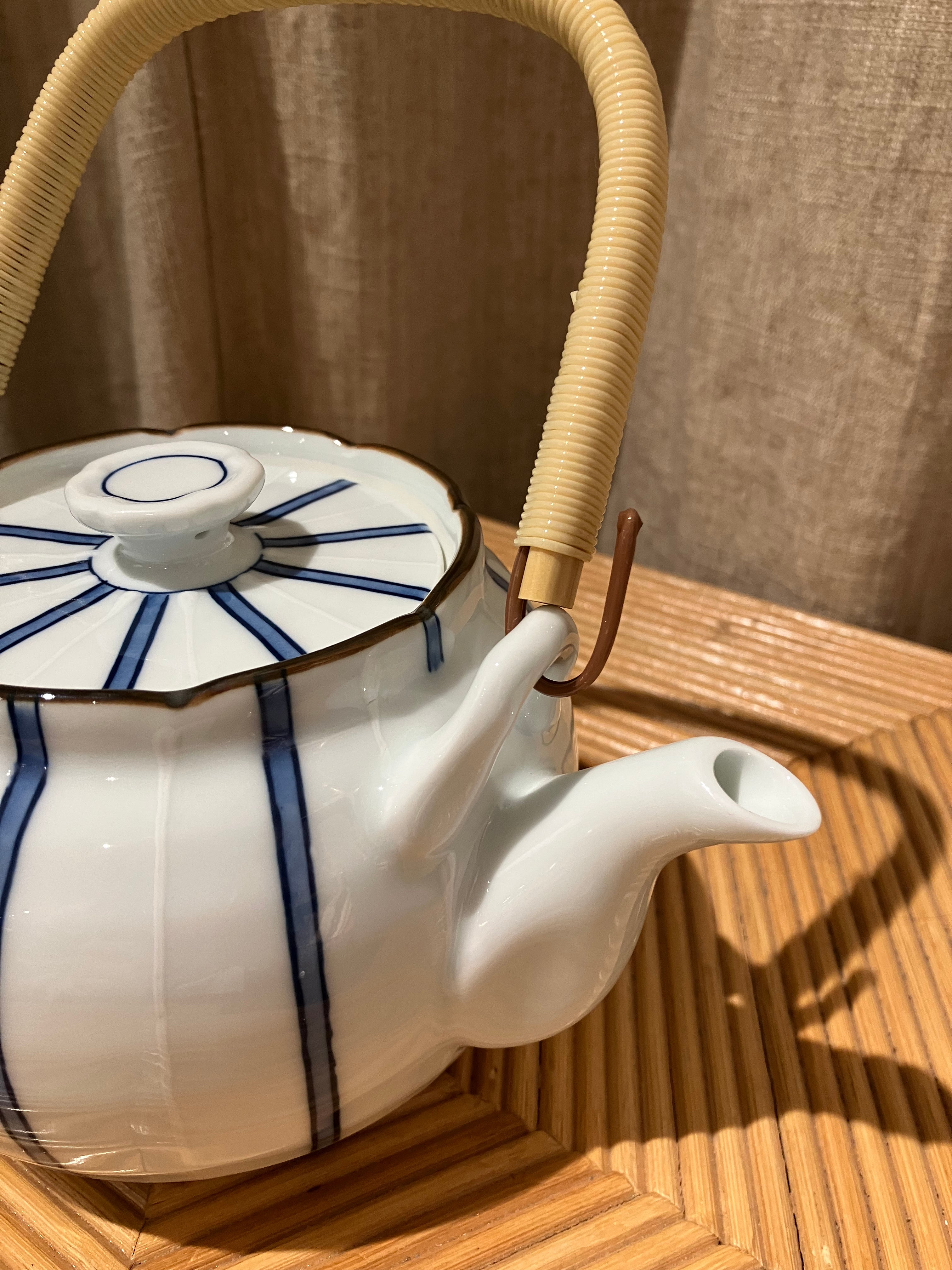 Teapot with blue stripes and handle
