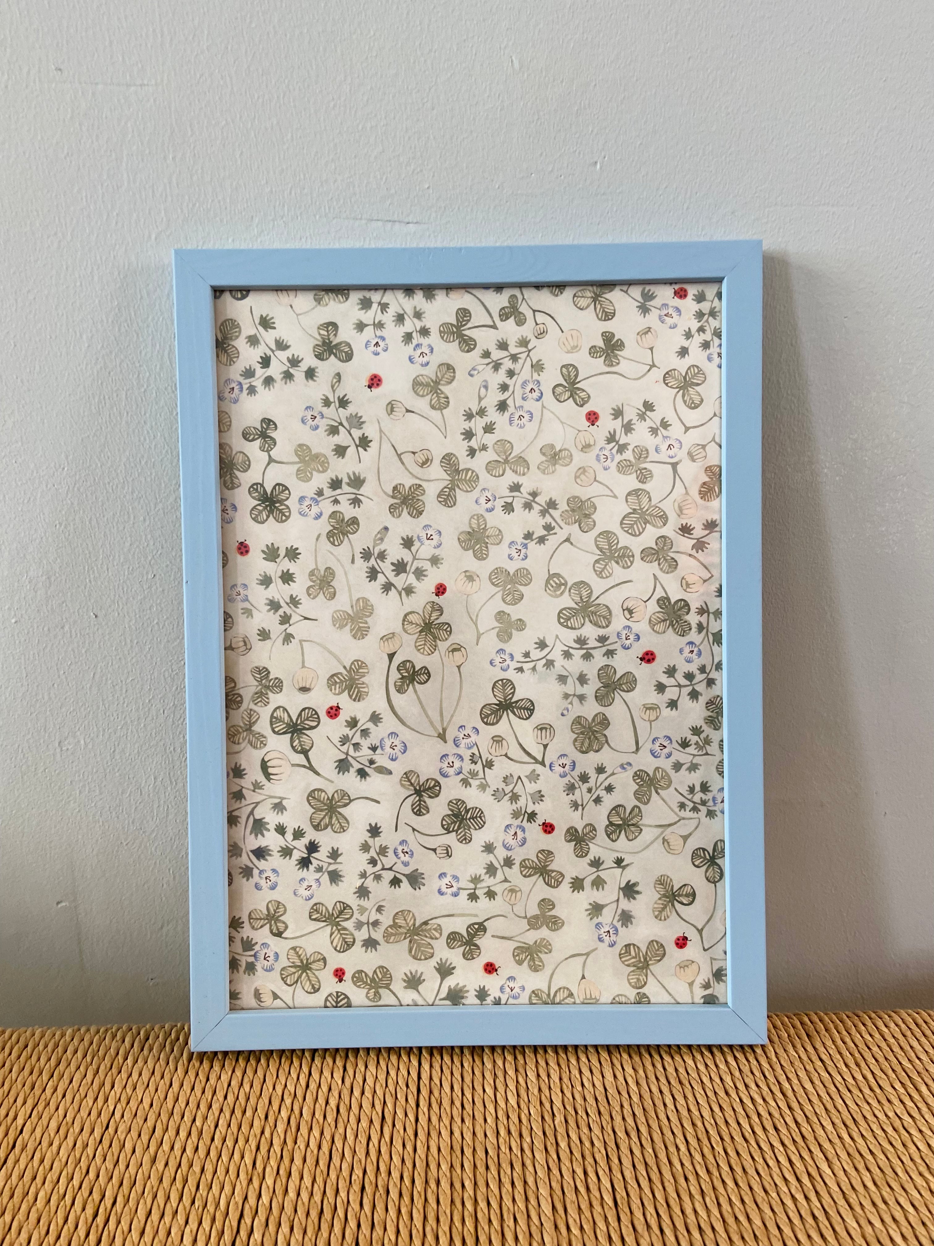 Clover with ladybirds in light blue frame
