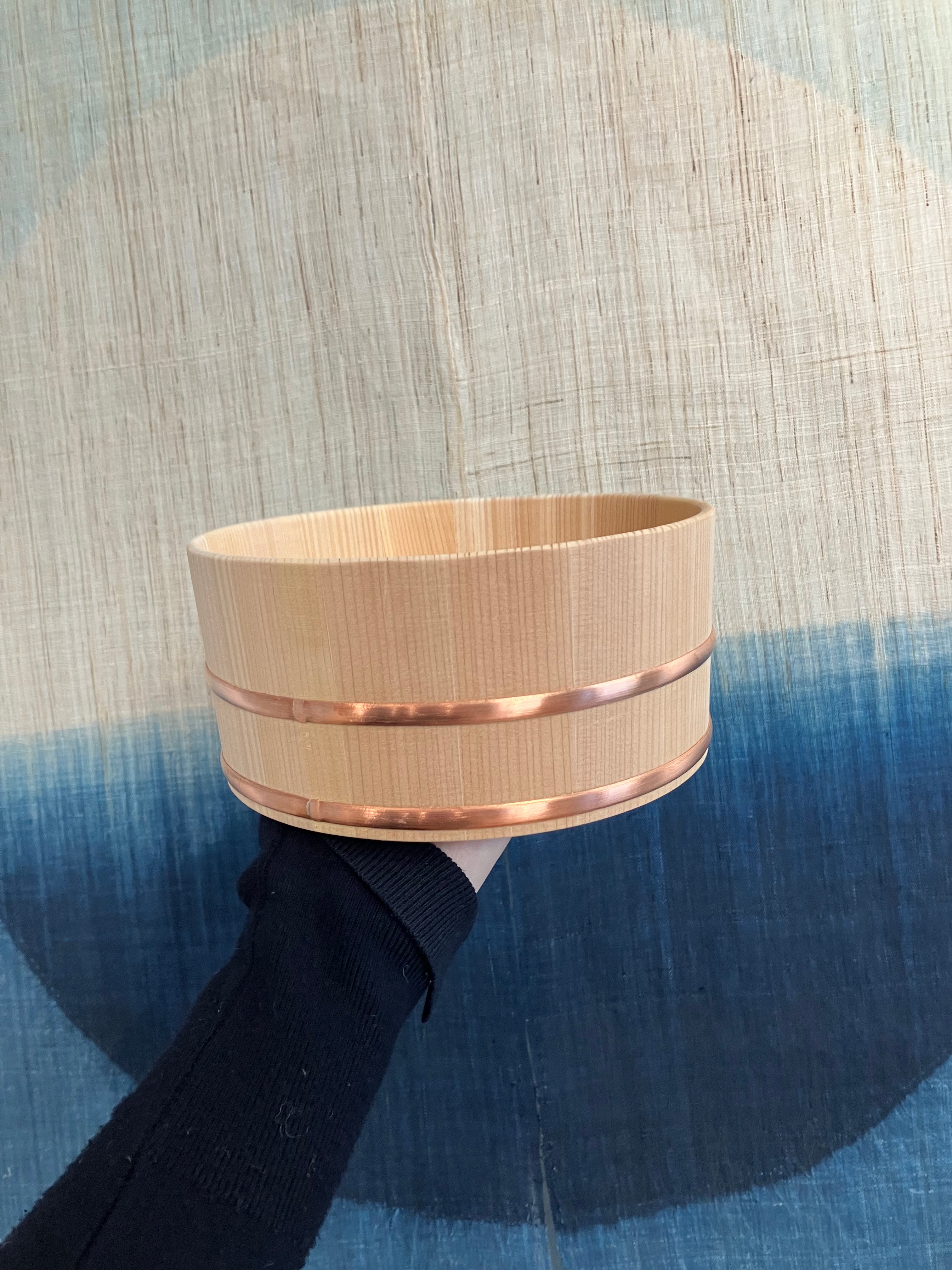 Small wooden tub with steel band