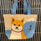 Taske med shiba og Mount Fuji