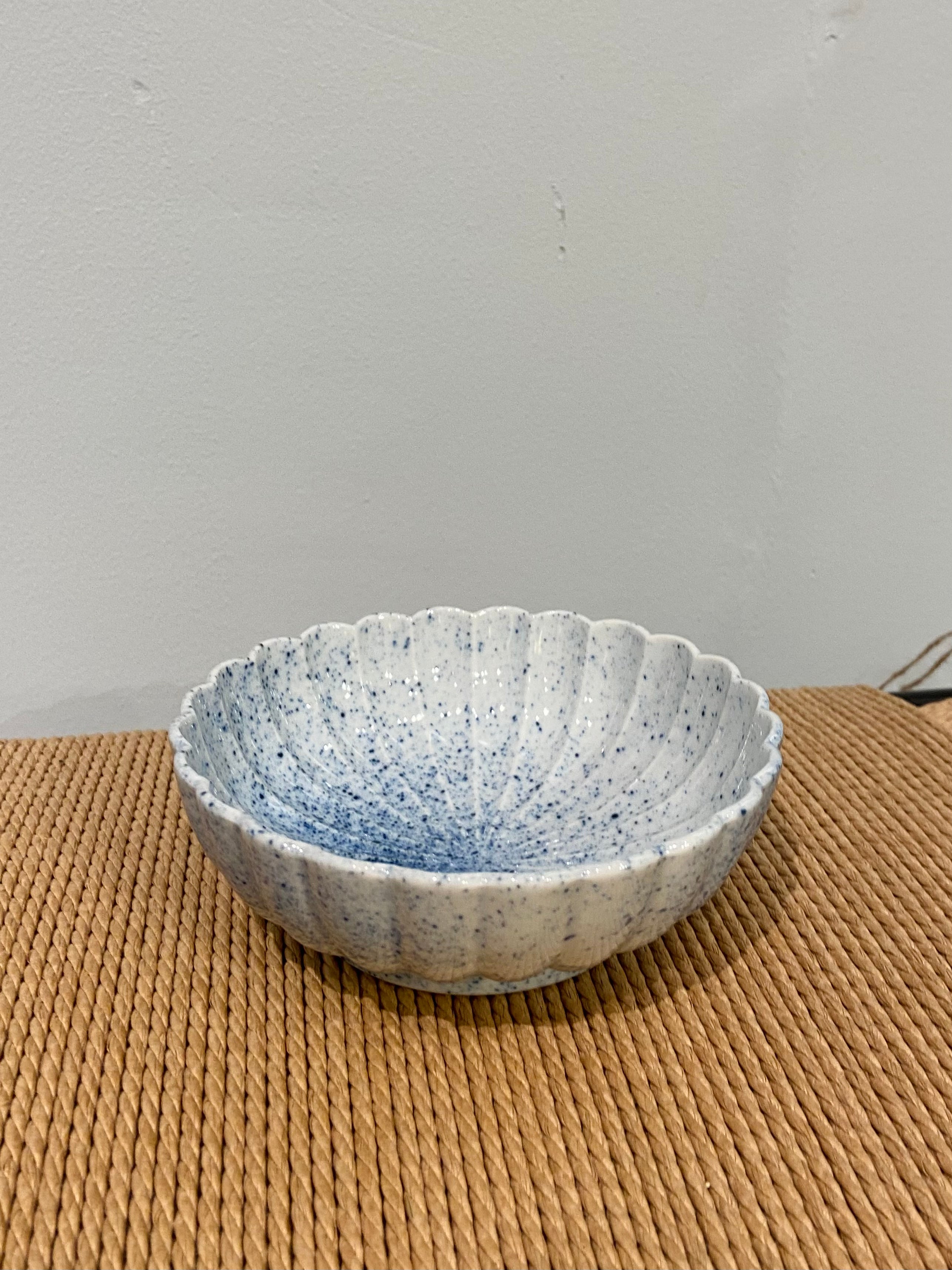 Large flower bowl with blue splash