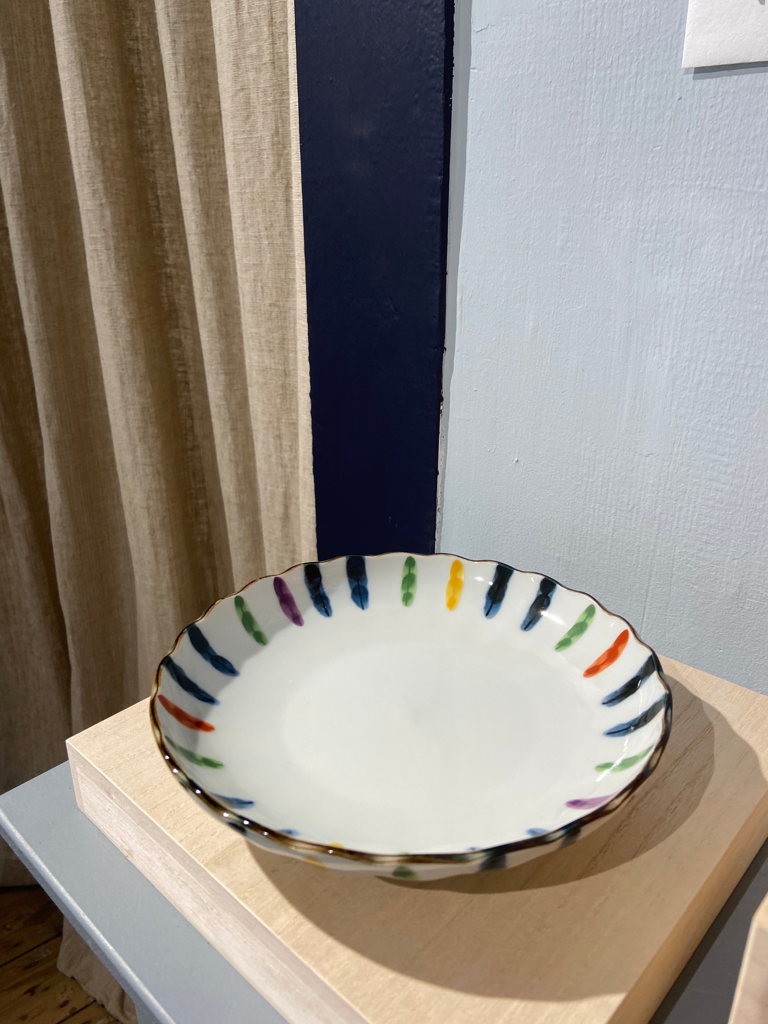 Hand painted plate with multicolored stripes